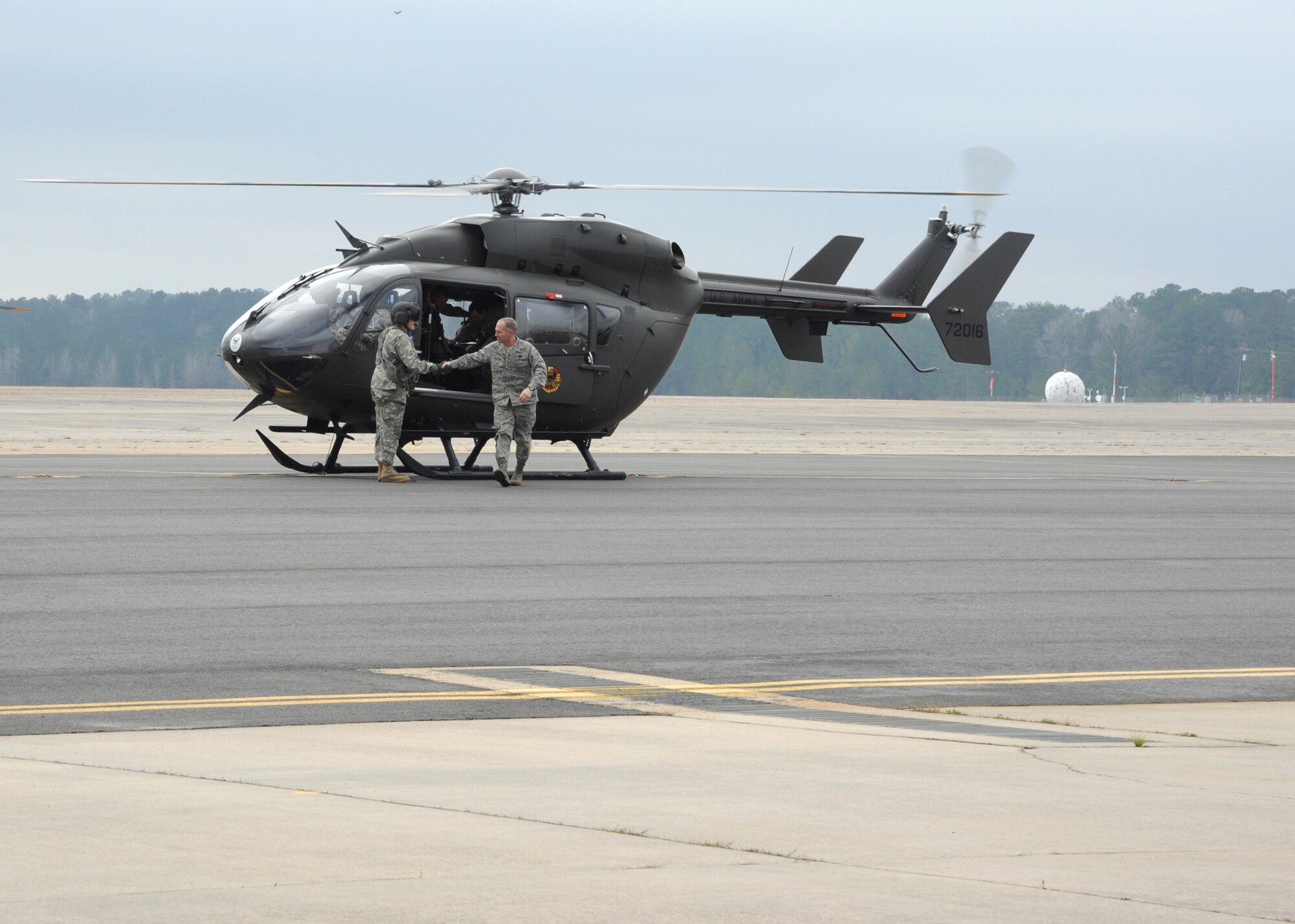 U.S. Air Force Gen. Mike Hostage, commander of Air Combat Command, exits a UH-1N Huey at Fort Polk, La., Jan. 24. Hostage visited Green Flag East to see the new capabilities of the base and observe Airmen training. (U.S. Air Force photo/Airman 1st Class Joseph A. Pagán Jr./Released)