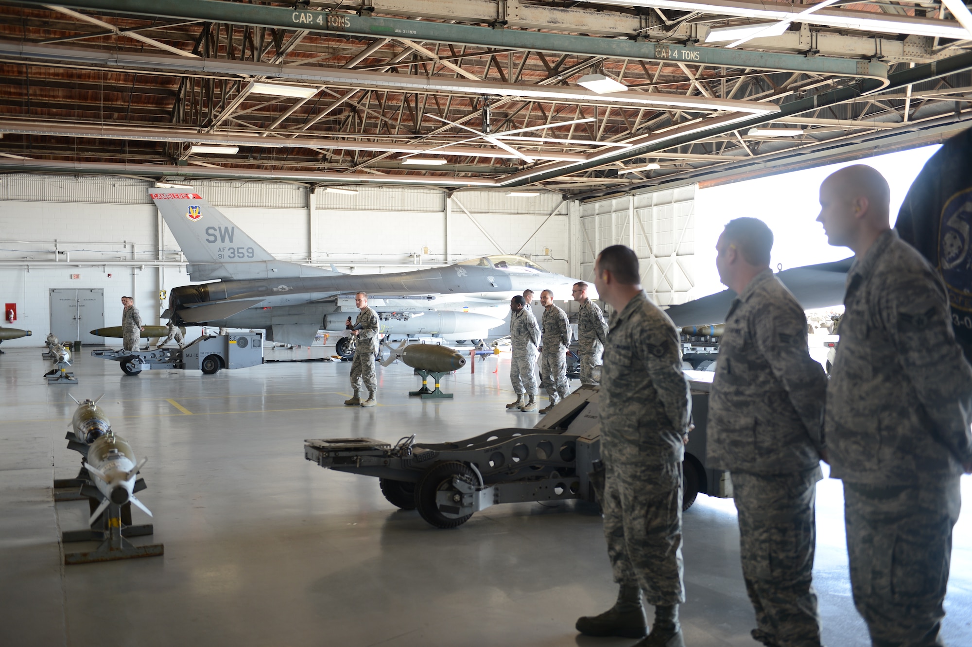 The 79th Aircraft Maintenance Unit “Tigers” competed against the 55th AMU “Shooters” at the Weapons Load Crew of the Year competition at Shaw Air Force Base, S.C., Feb. 1, 2013. The 77th AMU “Gamblers” will be competing from their deployed location and will send their scores. The weapon’s load competition is held once a quarter which leads up to the annual competition. The contests include a 20-question test based on the munitions the load crews are certified on, a uniform inspection, an inspection of their 250-piece tool box and their speed and efficiency in loading weapons. The weapons the competitors loaded included two types of air-intercept missiles, two AIM-120 missiles, two AIM-9M missiles and 510 rounds of 20mm ammunition. The results of the annual competition are scheduled to be released at the Maintenance Professional of the Year Banquet, April 26, 2013. (U.S. Air Force photo by Airman 1st Class Krystal M. Jeffers/Released)