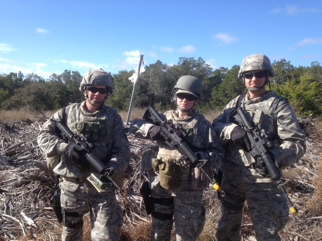 Senior Master Sgt. Mitch Morton, Tech. Sgt. Paige Martin and Master Sgt.
Bradley Bennett at pre-deployment training
