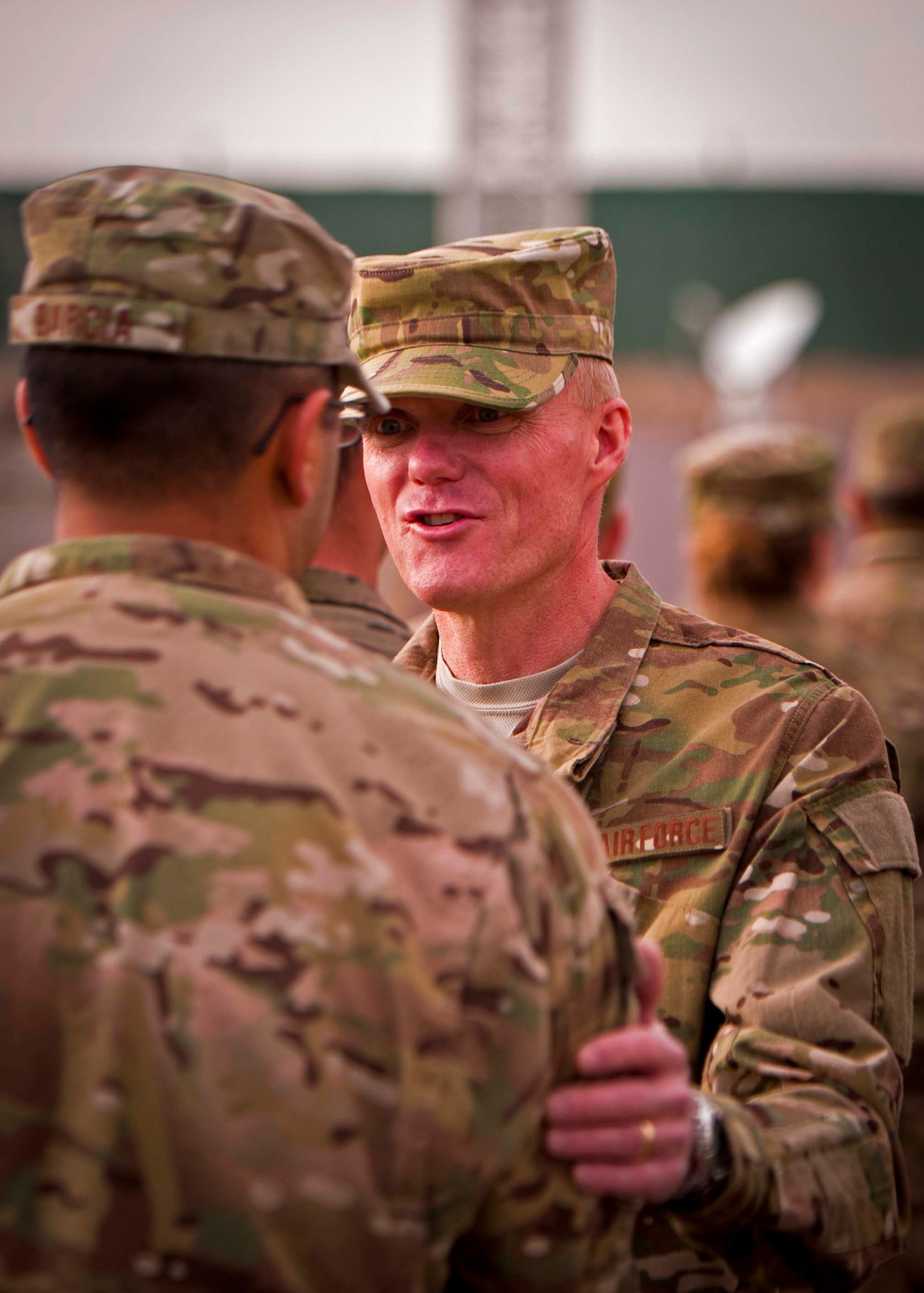 Chief Master Sgt. of the Air Force James Cody visits with an Airman at Kandahar Airfield, Afghanistan, Feb. 4. Cody and Air Force Chief of Staff Gen. Mark Welsh III visited KAF to thank the Airmen here for their service and to discuss their priorities for the Air Force. (U.S. Air Force photo/Senior Airman Scott Saldukas)