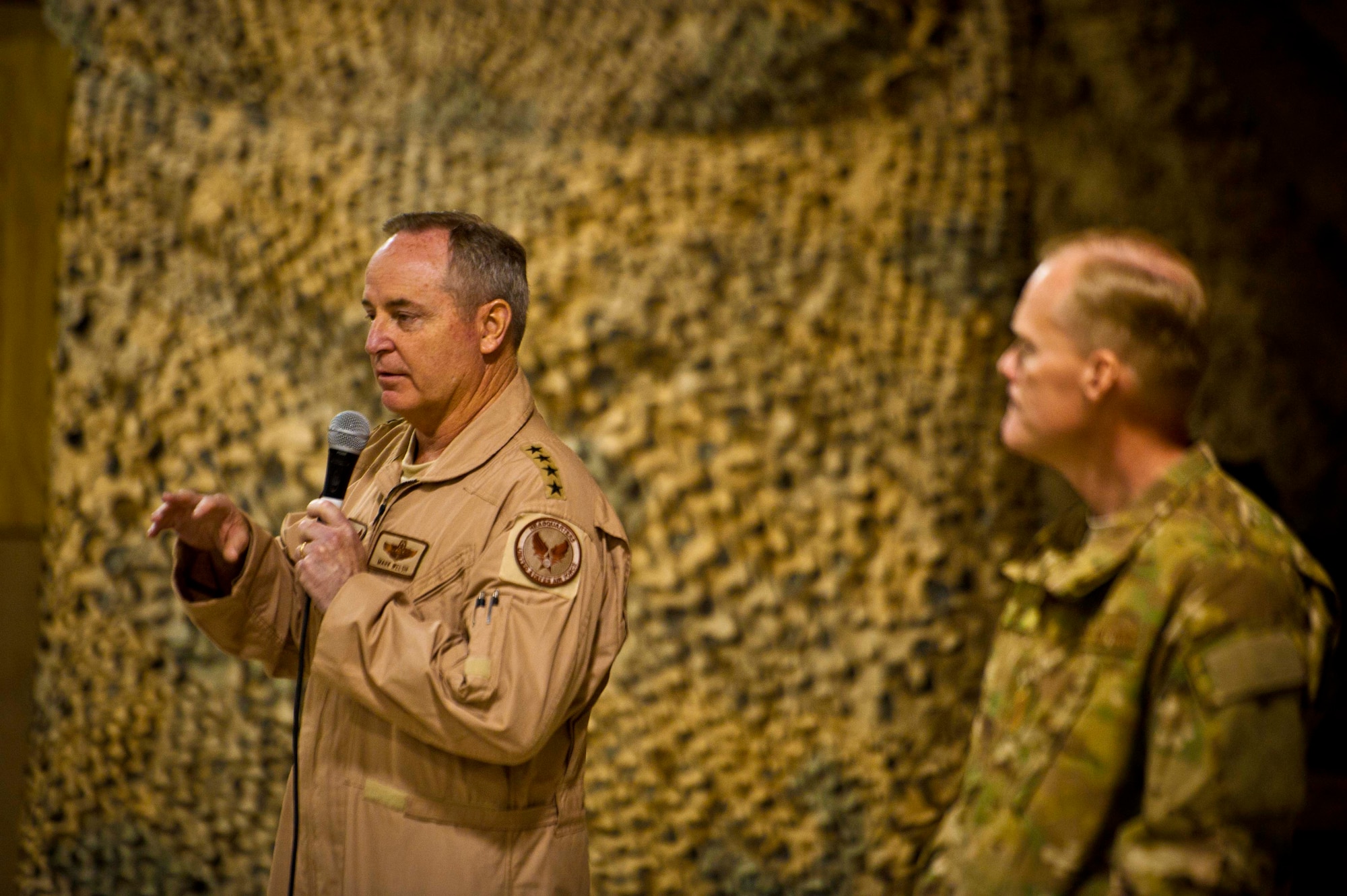 Air Force Chief of Staff Gen. Mark A. Welsh III speaks to Airmen at Kandahar Airfield, Afghanistan, Feb. 4. Welsh and Chief Master Sgt. of the Air Force James Cody visited KAF to thank the Airmen for their service and to discuss their priorities for the service. “We just want you to know that we’re proud of you,” the general said. “We want you to know that you make us look good each and every day, so thank you for that. More importantly, you make the nation look good every day. That’s what’s really important about what you’re doing.” (U.S. Air Force photo/Senior Airman Scott Saldukas)