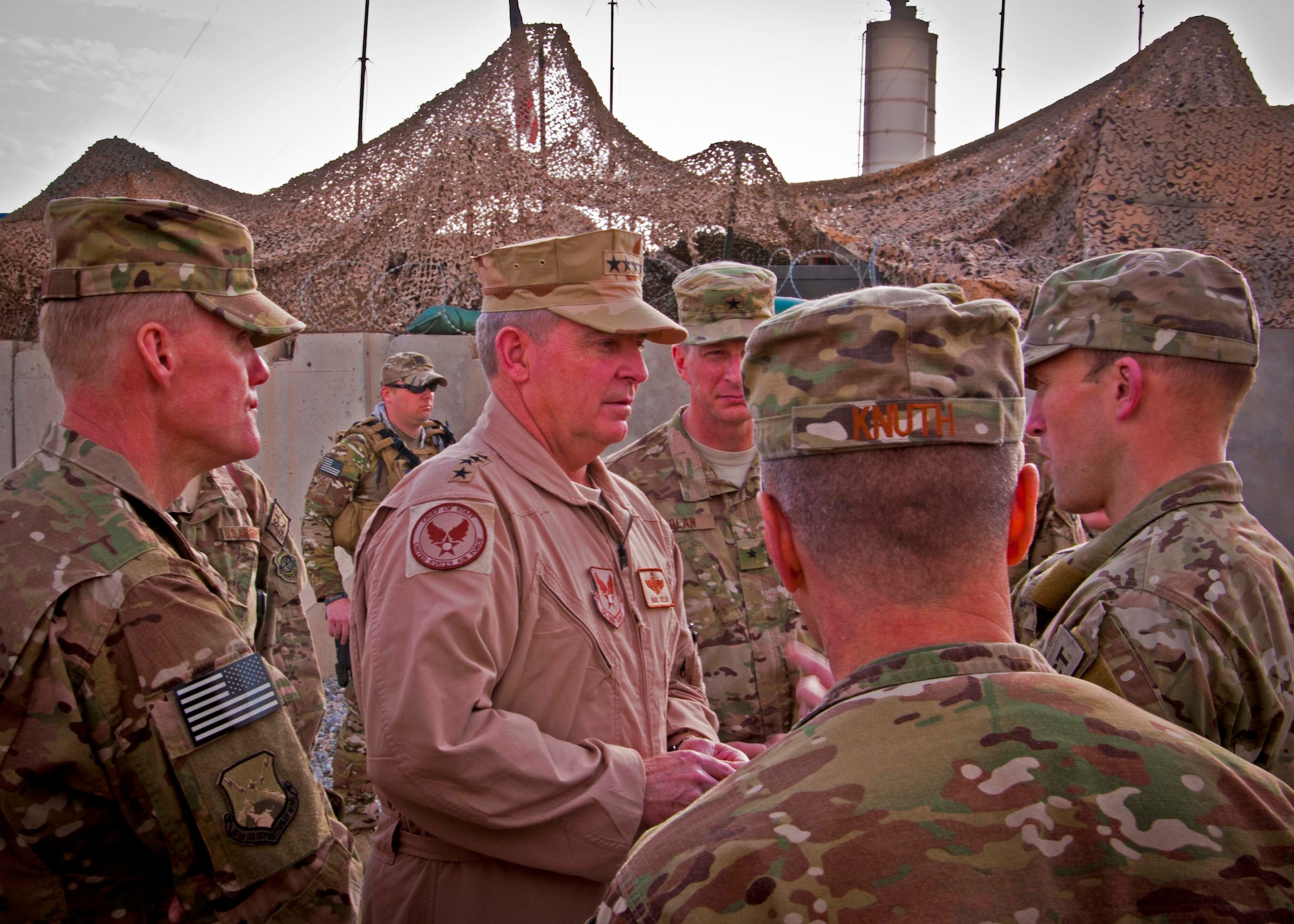 Air Force Chief of Staff Gen. Mark A. Welsh III and Chief Master Sgt. of the Air Force James Cody visit with Airmen at Kandahar Airfield, Afghanistan, Feb. 4. Welsh and Cody visited KAF as a part of a multi-base tour to meet with Airmen throughout the U.S. Central Command area of responsibility. (U.S. Air Force photo/Senior Airman Scott Saldukas) 