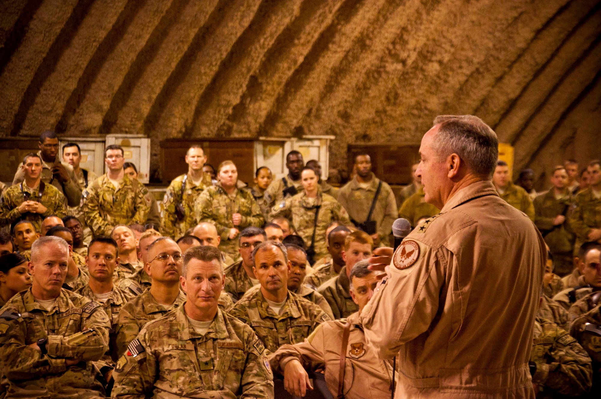 Air Force Chief of Staff Gen. Mark A. Welsh III speaks to Airmen at Kandahar Airfield, Afghanistan, Feb. 4. Welsh and Chief Master Sgt. of the Air Force James Cody visited KAF to thank the Airmen for their service and to discuss their priorities for the service. “Thanks for everything you do,” the general said during an Airman’s Call. “Thanks for making us proud to come to work every day. It is such a privilege to stand beside you guys.” (U.S. Air Force photo/Senior Airman Scott Saldukas)