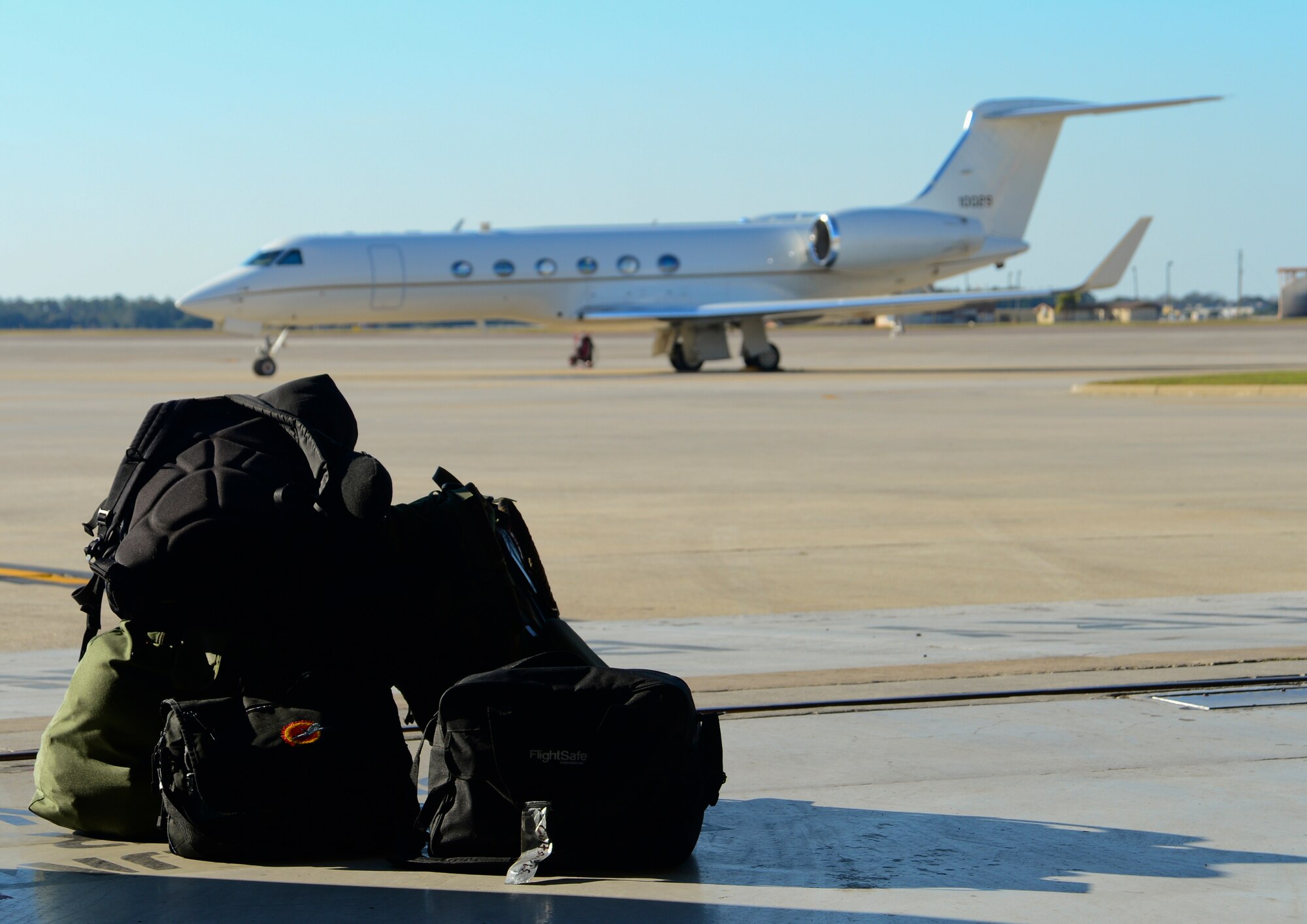 The luggage of members of the 310th Airlift Squadron waits to be loaded onto a C37A at MacDill Air Force Base, Fla., Jan. 27, 2013. (U.S. Air Force photo by Senior Airman Melissa Paradise/Released)