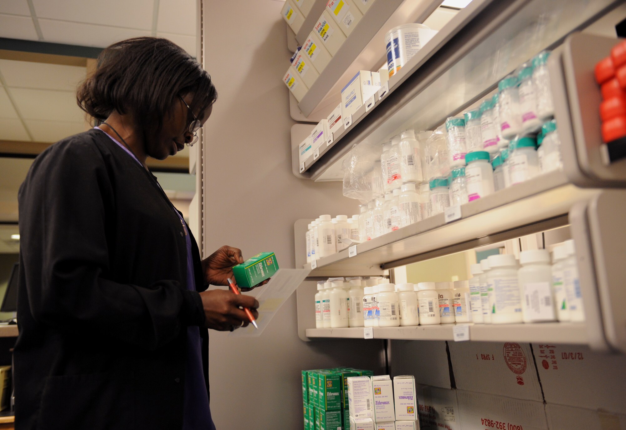 Terri Savage-Campbell, 2nd Medical Support Squadron pharmacy technician, verifies a prescription on Barksdale Air Force Base, La., Feb. 4. The base pharmacy is in charge of handling all medications needed to treat the active duty and reserve population of Barksdale and retirees in the local community. (U.S. Air Force photo/Airman 1st Class Benjamin Gonsier)
