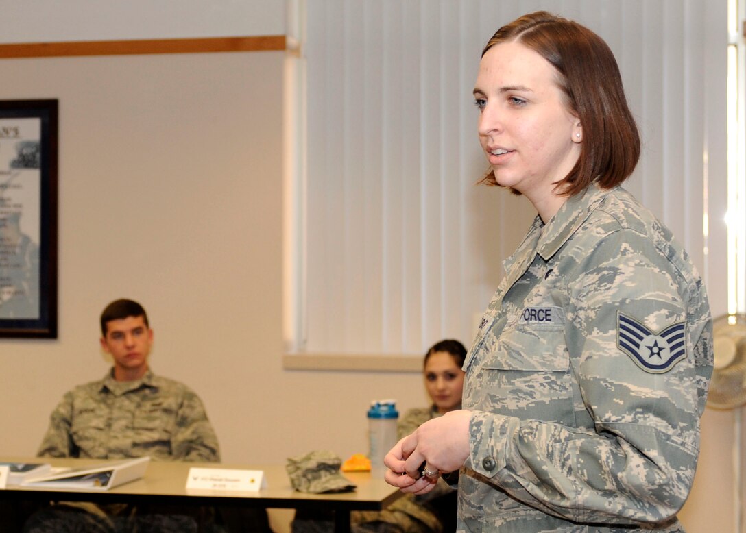 Staff Sgt. Jessica Tabor, 28th Bomb Wing Equal Opportunity office advisor, speaks to a First Term Airman Center class in the FTAC classroom at Ellsworth Air Force Base, S.D., Jan. 30, 2013. The EO staff uses a proactive approach to improve the human relations climate of the base through educating Airmen and civilian employees on how to treat each other with dignity and respect. (U.S. Air Force photo by Airman Ashley J. Thum/Released)