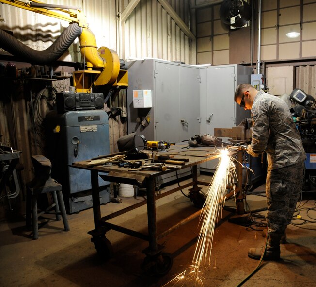 Airman 1st Class Jacob Stevens, 2nd Civil Engineer Squadron structures section, uses an oxyacetylene torch to cut through metal plates for training on Barksdale Air Force Base, La., Feb. 4. New Airmen train with various tools and equipment for up to 15 months before upgrading to the journeyman skill level. (U.S. Air Force photo/Airman 1st Class Andrew Moua)