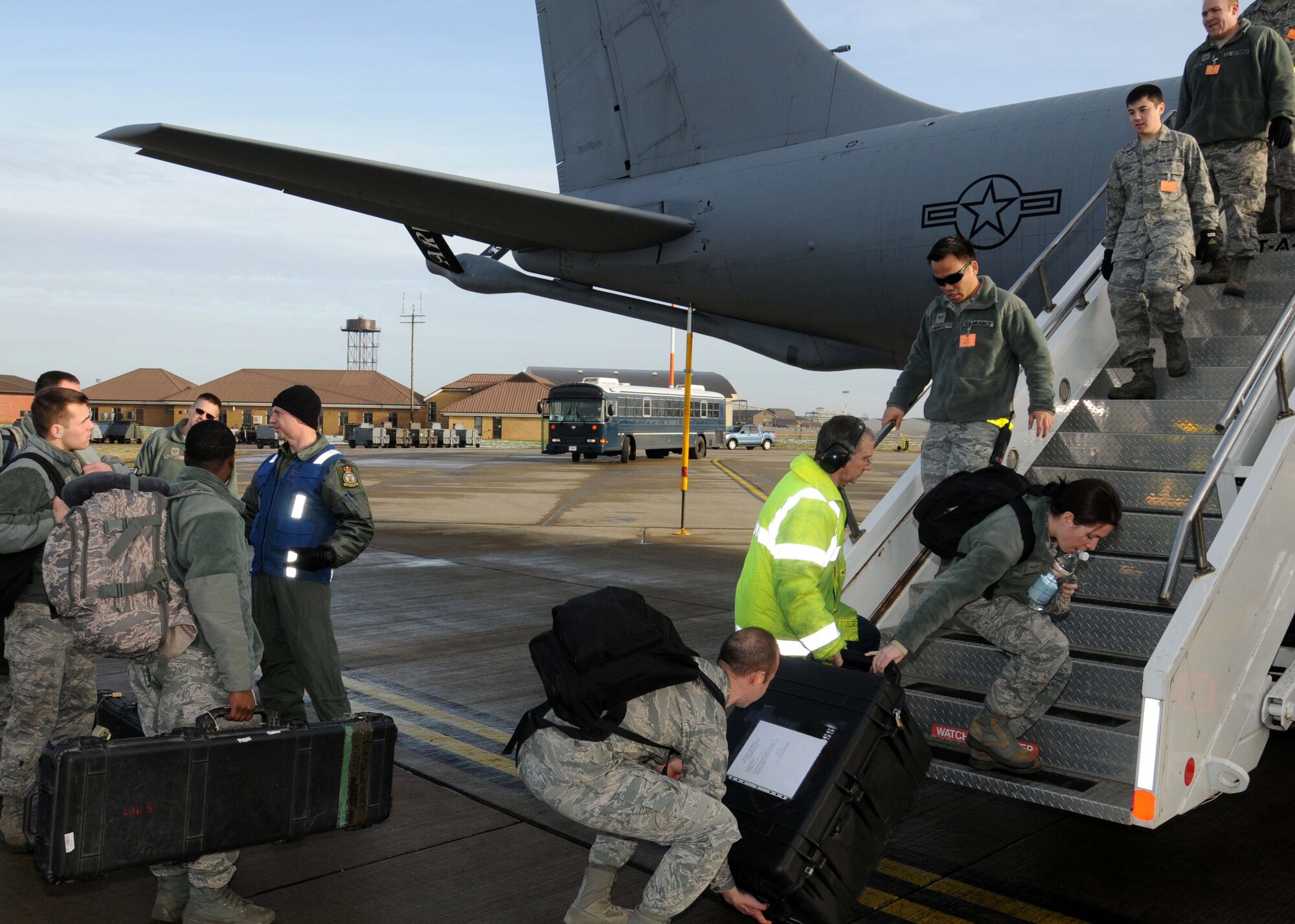 Airmen from the 100th Air Refueling Wing load luggage onto a KC-135R Stratotanker in preparation for a deployment in support of operations in Mali Jan. 26, 2013, at RAF Mildenhall, England. The 100th ARW will provide a much-needed air-to-air refueling capability to forces operating in Northern Africa. Approximately 130 Airmen deployed out of RAF Mildenhall after receiving their deployment order to support French operations in Mali. (U.S. Air Force photo by 1st Lt. Christopher Mesnard/Released)