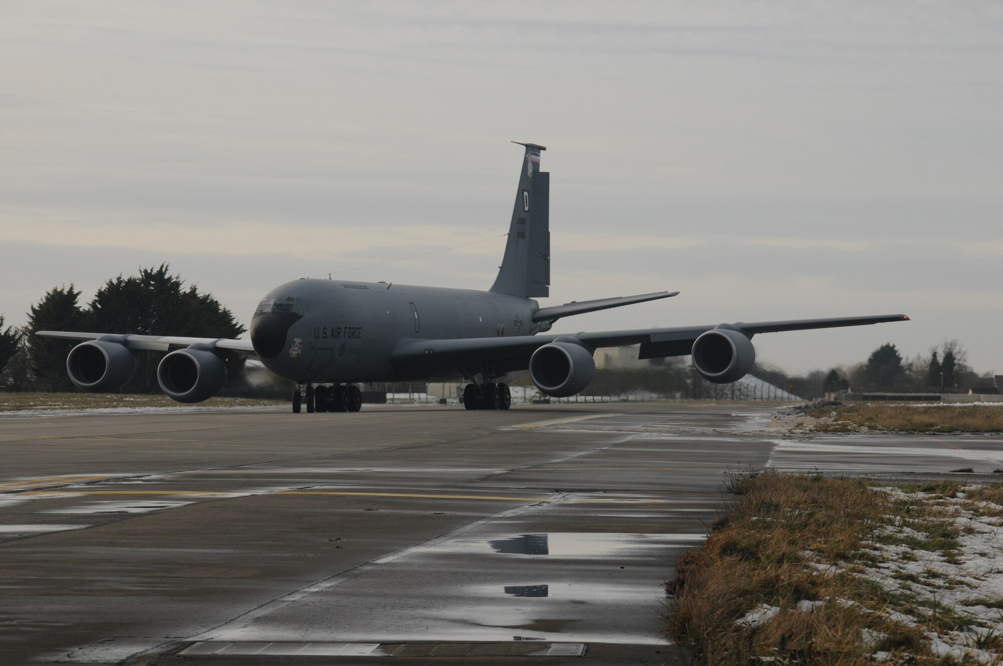 A KC-135R Stratotanker taxis to the runway while carrying numerous Airmen from the 100th Air Refueling Wing who are deploying in support of operations in Mali Jan. 26, 2013, at RAF Mildenhall, England. The 100th ARW will provide a much-needed air-to-air refueling capability to forces operating in Northern Africa. Approximately 130 Airmen deployed out of RAF Mildenhall after receiving their deployment order to support French operations in Mali. (U.S. Air Force photo by 1st Lt. Christopher Mesnard/Released)