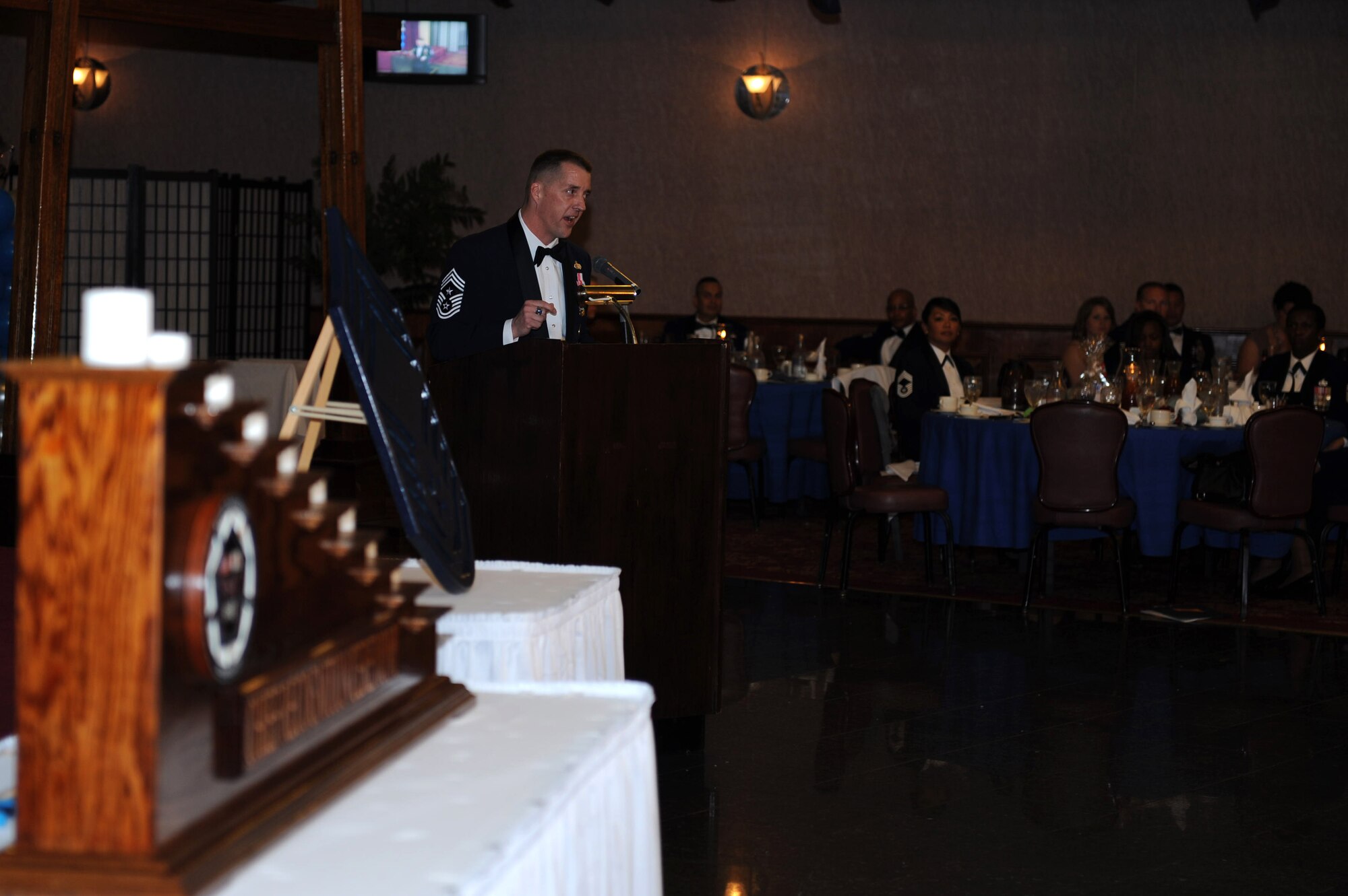 U.S. Air Force Chief Master Sgt. Douglas McIntyre, U.S. Forces, Japan, and 5th Air Force command chief, speaks at the chief recognition ceremony at the Rocker NCO Club on Kadena Air Base, Japan, Feb. 1, 2013. The four-time command chief advised the promotees to remember where they came from as well as to be credible and uphold integrity and excellence throughout their careers as chief master sergeants. (U.S. Air Force photo/Airman 1st Class Hailey R. Davis)