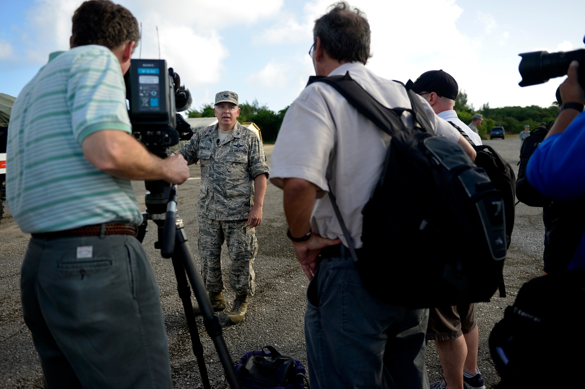 U.S. Air Force Colonel Thomas K. Livingston, Commander of 36th Contingency Response Group, briefs media on his unit’s role in Cope North 13 on Northwest Field, Guam, Feb. 5, 2013. Cope North is a multilateral Pacific Air Forces-sponsored Field Training Exercise (FTX) conducted annually at Andersen Air Force Base, Guam. The exercise focuses on humanitarian assistance and disaster relief training, air combat tactics and large force employment in an effort to enhance interoperability among U.S., Japan and Australian forces. (U.S. Air Force photo by Senior Airman Matthew Bruch/RELEASED)