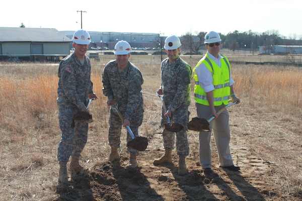 The key participants break ground on Jan. 29 for the new $30 million Asymmetric Warfare Group (AWG) complex on Fort Meade, Md.  They include (from left): Col. Edward Rothstein, Fort Meade installation commander; Lt. Col Brad Endres, U.S. Army Corps of Engineers, Baltimore District, deputy commander; Col. Patrick Mahaney, AWG commander; and Joe Tierney, Skanska Construction.