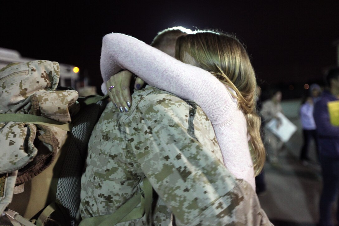 Master Sgt. Edward Haynes, 36, from Las Vegas, and a signals intelligence chief with I Marine Expeditionary Force (FWD), embraces his wife, Rena Haynes, at a homecoming at Camp Pendleton, Calif., Feb. 6. Haynes returned from a yearlong deployment to Afghanistan. The homecoming marks the first wave for I MEF (FWD) to return from Afghanistan. The entire unit is scheduled to return by mid-March.


