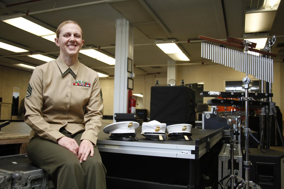 Staff Sgt. Terri L. Kopetzki, a clarinet instrumentalist with the 2nd Marine Aircraft Wing Band, spent several months wearing a revised version of the female dress cover, as well as the current male dress cover, as part of an initiative to change the female covers started more than 11 years ago by General James T. Conway, the 34th Commandant of the Marine Corps.