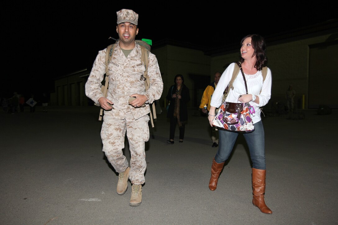 Maj. Tom Chhabra, from Silver Lake, Kan., and a development officer with I Marine Expeditionary Force (Forward), walks to his car with his wife, Janelle, after his homecoming at Camp Pendleton, Calif., Feb. 6. The Chhabra’s were married shortly before Tom deployed to Afghanistan and haven’t seen each other for one year. The homecoming marks the first wave for I MEF (FWD) to return from Afghanistan. The entire unit is scheduled to return by mid-March.


