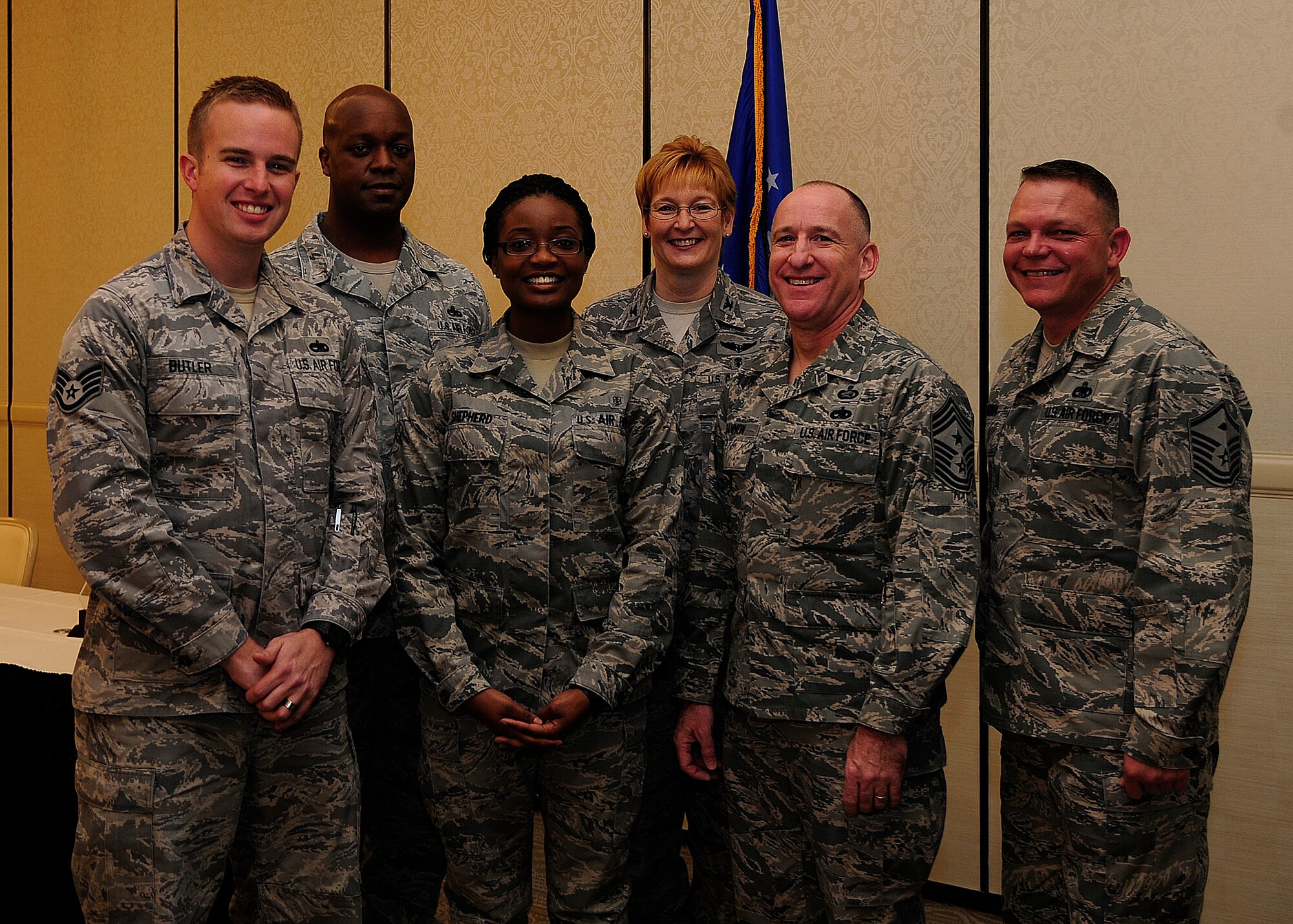 Diamond Sharp winners gather after a ceremony recognizing their accomplishments Feb. 4, 2013, at the Charleston Club at Joint Base Charleston – Air Base, S.C. (Left to right) Staff Sgt. Kristan Butler, 373rd Training Squadron instructor and Diamond Sharp recipient, Master Sgt. Julius Walker, 373rd TRS first sergeant, Airman 1st Class Amber Shepherd, 628th Medical Group and Diamond Sharp recipient, Col. Judith Hughes, 628th MDG commander, Chief Master Sgt. Al Hannon, 628th Air Base Wing command chief, and Master Sgt. Kevin Brown, 628th MDG first sergeant. Diamond Sharp awards are designed to recognize individuals in a unit who stand out to their first sergeant. (U.S. Air Force photo/Staff Sgt. Rasheen Douglas)