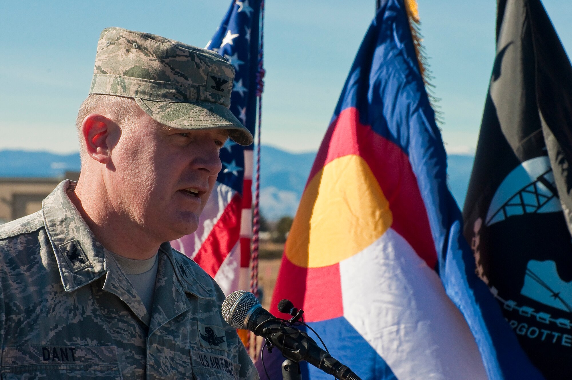 Col. Daniel Dant, 460th Space Wing commander, addresses the audience just before ground is broken for the Colorado Freedom Memorial Feb. 2, 2013, in Aurora, Colo. The memorial is a 12-year effort led by Rick Crandall and members for the CFM Foundation. The memorial will list the names of all Colorado service members who died during combat operations on foreign soil since Colorado became a state. This is the first memorial of its kind, which names members from all service branches and all wars. (Colorado Air National Guard photo by Capt. Darin Overstreet/Released)