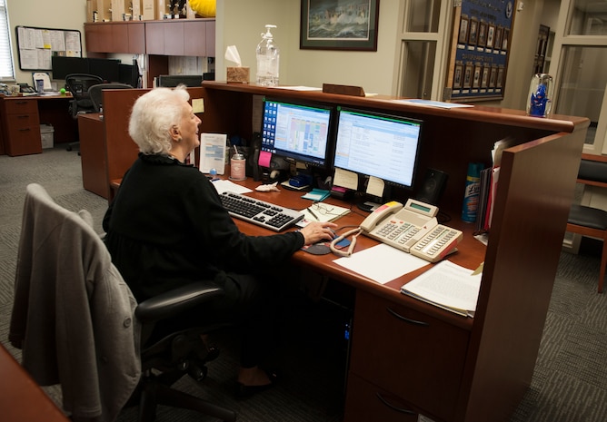 Karen Bevis, secretary for the 437th Operations Group commander, looks through emails Feb. 5, 2013, at Joint Base Charleston - Air Base, S.C. Bevis has been in the civil service for her 40 years. (U.S. Air Force photo/ Airman 1st Class Ashlee Galloway)