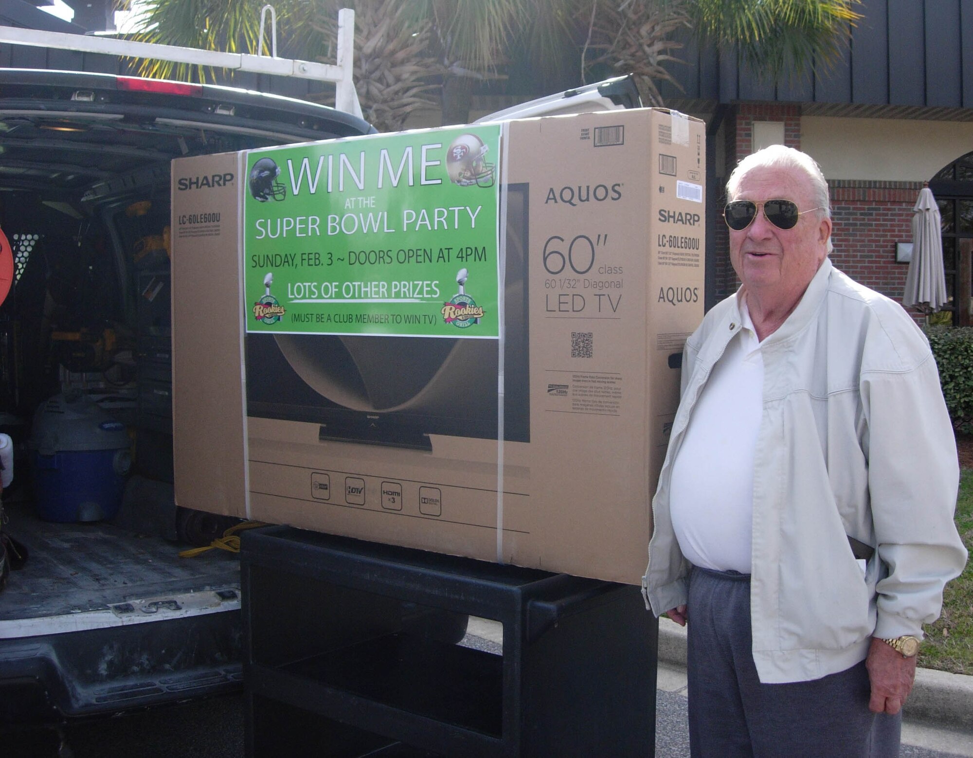 Robert Schoenleber displays his 60” LED TV he won at the Charleston Club’s Super Bowl Party Feb. 3, 2013. “I was sitting in Rookies, right in front of the bartender who was pulling the names for all of the prizes,” Schoenleber said. “When the bartender called my name, everyone was joking that the drawing was rigged!” Schoenleber has been a Charleston Club member since the 1960s. A Charleston Club Membership drive is now in progress and new members can enjoy dozens of benefits. Stop by the Charleston Club or Redbank Club offices to apply or for more details on Club Membership. (Courtesy photo)