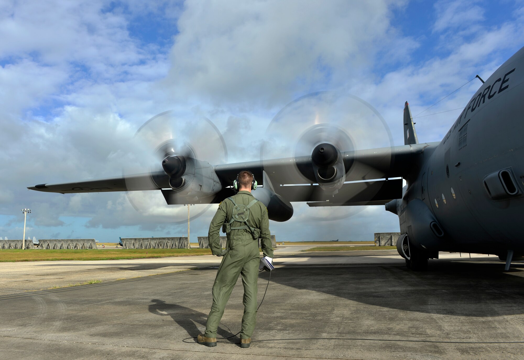 U.S. Air Force Senior Airman Timothy Oberman, a C-130H loadmaster with the 36th Airlift Squadron, Yokota Air Base Japan, conducts pre-flight inspections before flying in support of Cope North 13 on Anderson Air Force Base, Guam, Feb. 6, 2013. Cope North is an annual air combat tactics, humanitarian assistance and disaster relief exercise designed to increase the readiness and interoperability of the U.S. Air Force, Japan Air Self-Defense Force and Royal Australian Air Force. (U.S. Air Force photo by Senior Airman Matthew Bruch/Released)