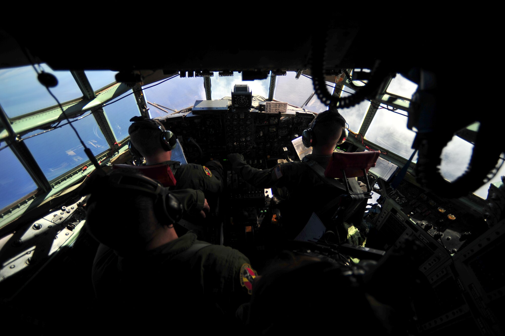 A U.S. Air Force C-130H crew from the 36th Airlift Squadron, Yokota, Japan, conducts a humanitarian aid and disaster relief mission near Guam in support of Cope North 13, Feb. 6, 2013. Cope North is a multilateral aerial exercise, held once or twice yearly, designed to increase the combat readiness and interoperability of the U.S. Air Force, Japan Air Self-Defense Force, Royal Australian Air Force and other Pacific partner nations. (U.S. Air Force photo by Senior Airman Matthew Bruch/Released)
