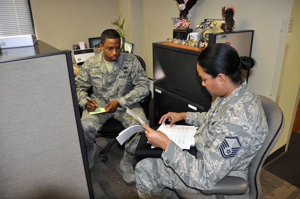 (Front) Master Sgt. Lashammia Kellam, Air Force Reserve Command inspection team member, goes through a records management checklist with Tech. Sgt. Natrell Curry, 926th Group base records manager, here Feb. 2 as part of the group's first Compliance Unit Inspection. (U.S. Air Force photo/Maj. Jessica Martin)