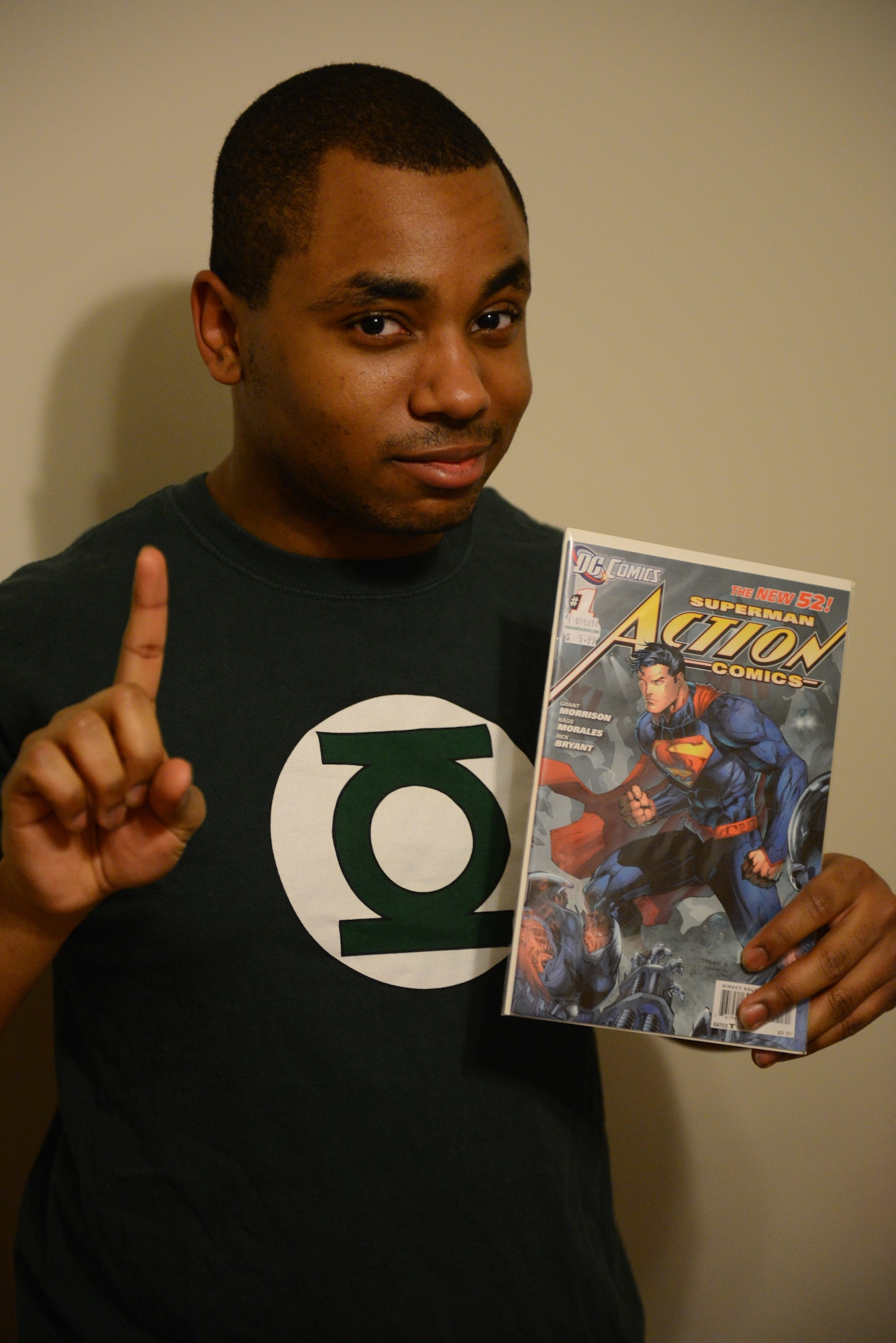 Airman 1st Class Jeremy Evans displays his favorite comic book. The hero-craze started when he was a just a child of seven growing up in the south side of Chicago. (U.S. Air Force photo/Airman 1st Class Jake Eckhardt)