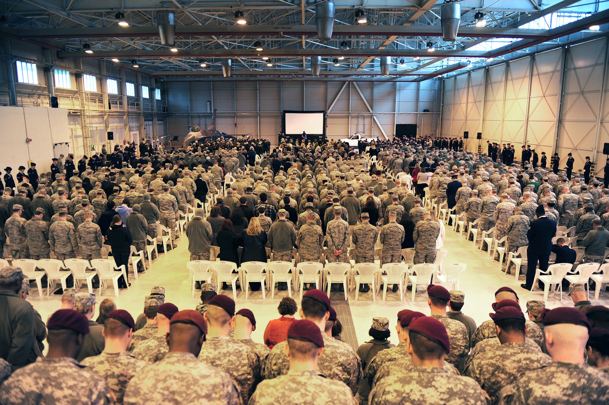 A memorial service for Maj. Lucas Gruenther is held in a hangar on Aviano Air Base, Italy, Feb. 6, 2013. Approximately 1,000 people attended the memorial service for Gruenther, who past away when his F-16 went down over the Adriatic Sea Jan. 28. (U.S. Air Force photo/Staff Sgt. Justin Weaver)