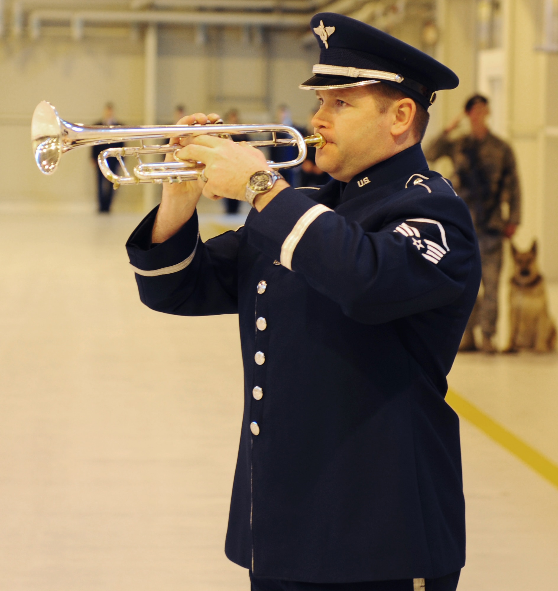 Master Sgt. Tim Allums, United States Air Forces Europe bandsman, plays taps during a memorial service for Maj. Lucas Gruenther on Aviano Air Base, Italy, Feb. 6, 2013. Approximately 1,000 people attended the memorial service for Gruenther, who past away when his F-16 went down over the Adriatic Sea Jan. 28. (U.S. Air Force photo/Staff Sgt. Justin Weaver)