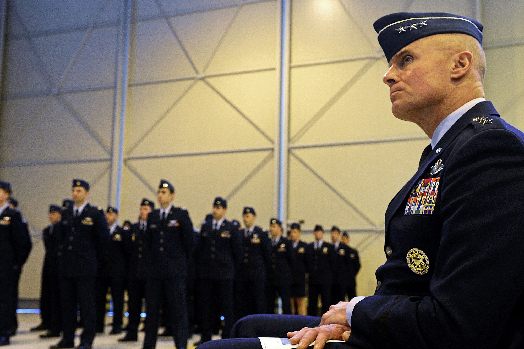 Lt. Gen. Craig Franklin, 3rd Air Force commander, listens during a memorial service on Aviano Air Base, Italy, Feb. 6, 2013. Approximately 1,000 people attended the memorial service for Gruenther, who past away when his F-16 went down over the Adriatic Sea Jan. 28. (U.S. Air Force photo/Airman 1st Class Matthew Lotz)