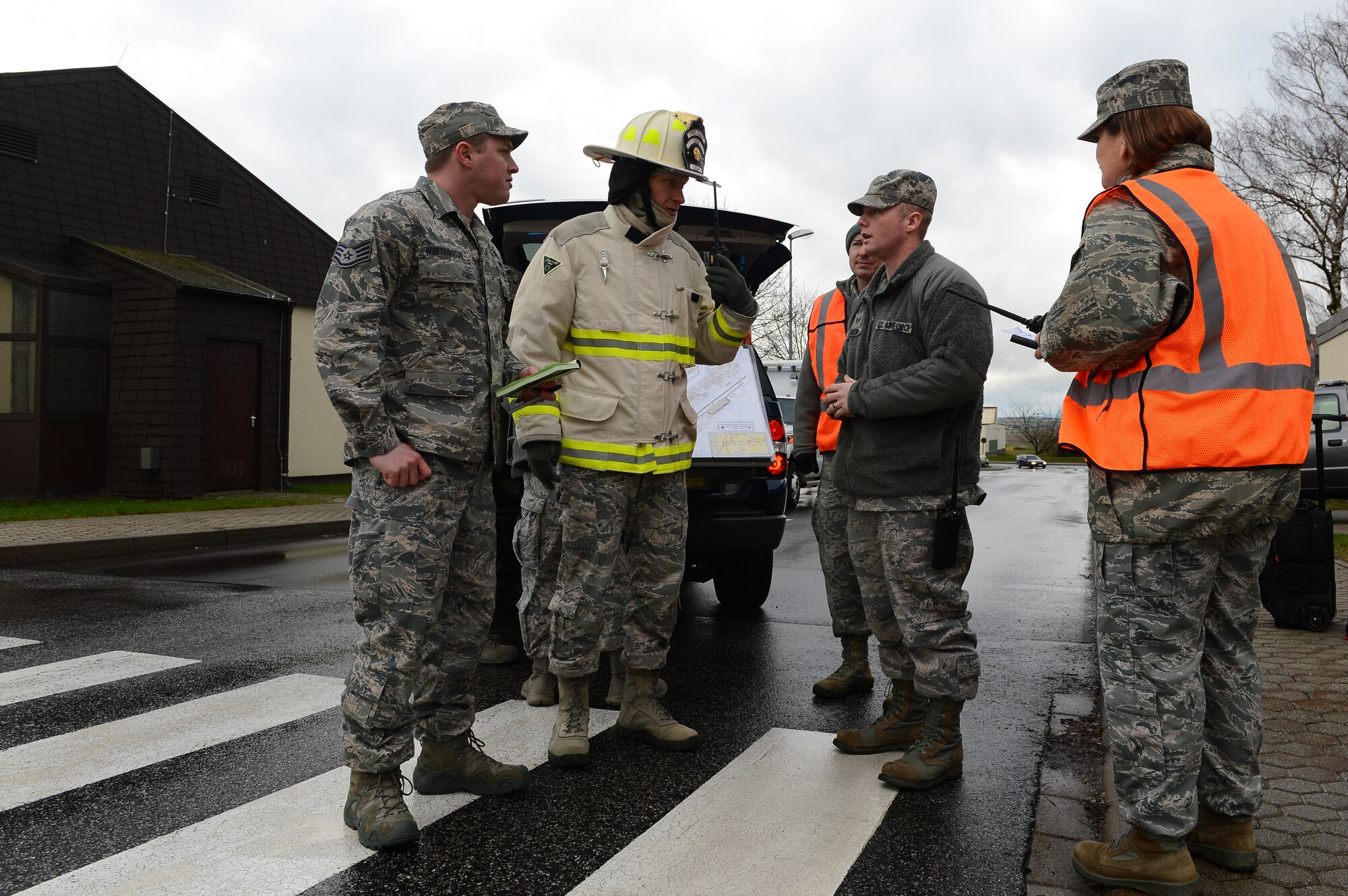 SPANGDAHLEM AIR BASE, Germany – First responders from the 52nd Fighter Wing coordinate with one another to properly dispose of a suspicious package during a base exercise Feb. 5, 2013. The exercise tests the skills of the base’s response centers to ensure continuous readiness. (U.S. Air Force photo by Senior Airman Dillon Davis/Released)
