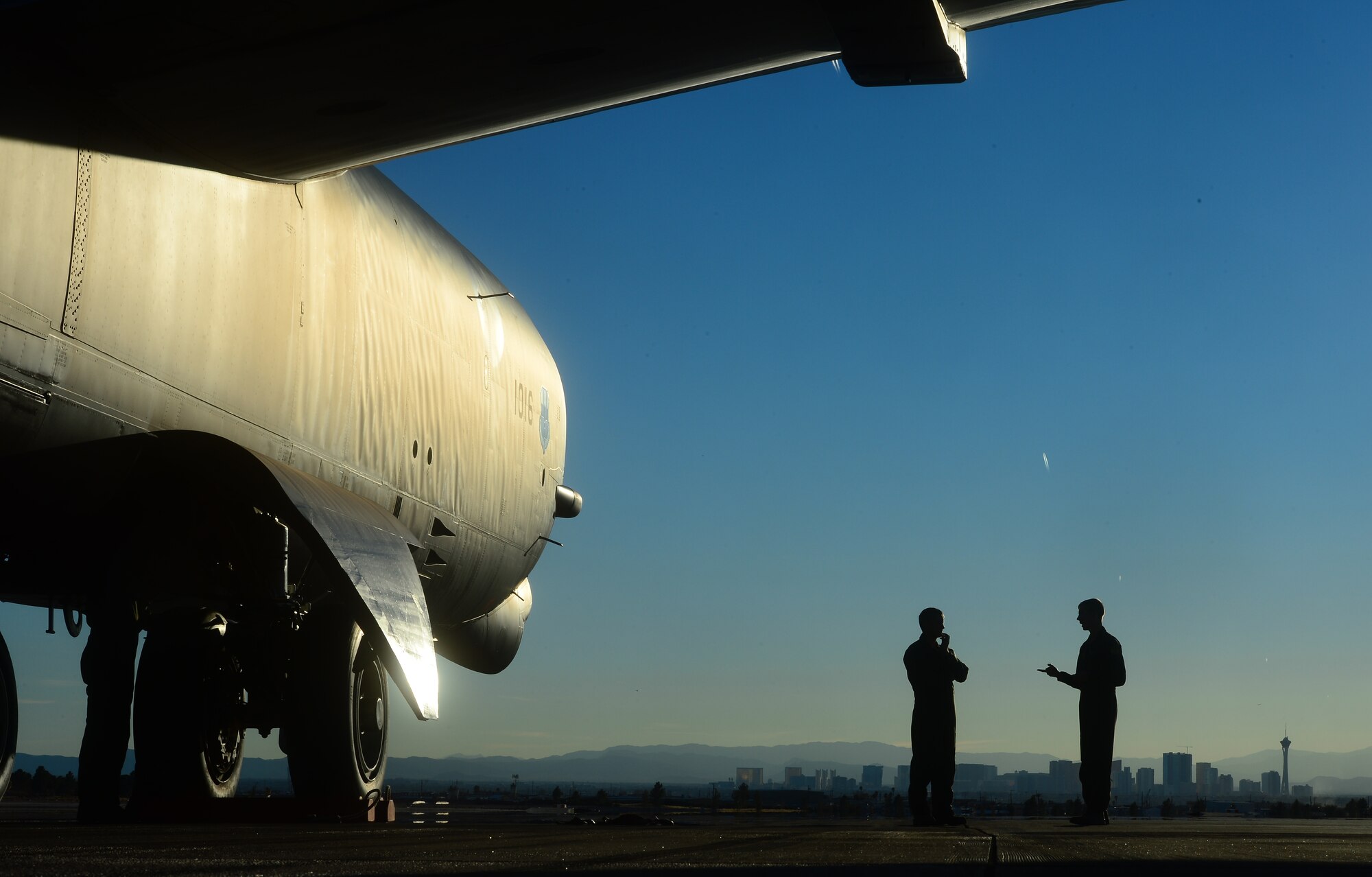 Air Force 1st Lts. Joshua King, B-52 Stratofortress electronic warfare operator, and Christopher Shuler, B-52 navigator, both with the 20th Bomb Squadron, discuss their flight during a Red Flag exercise at Nellis Air Force Base, Nev., Jan. 31, 2013. Their squadron hails from Barksdale Air Force Base, La. (U.S. Air Force photo/Staff Sgt. Vernon Young Jr.)