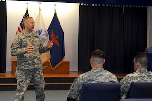 U.S. Army Col. Dean Heitkamp, 128th Aviation Brigade commander, speaks to the audience during an awards ceremony at Fort Eustis, Va., Feb. 1, 2013. The Noncommissioned Officer of the Year, Instructor of the Quarter, and 11 Master Instructors were presented Army Commendation Medals, along with other awards for their outstanding efforts and contributions. (U.S. Air Force photo by Staff Sgt. Ashley Hawkins/Released)