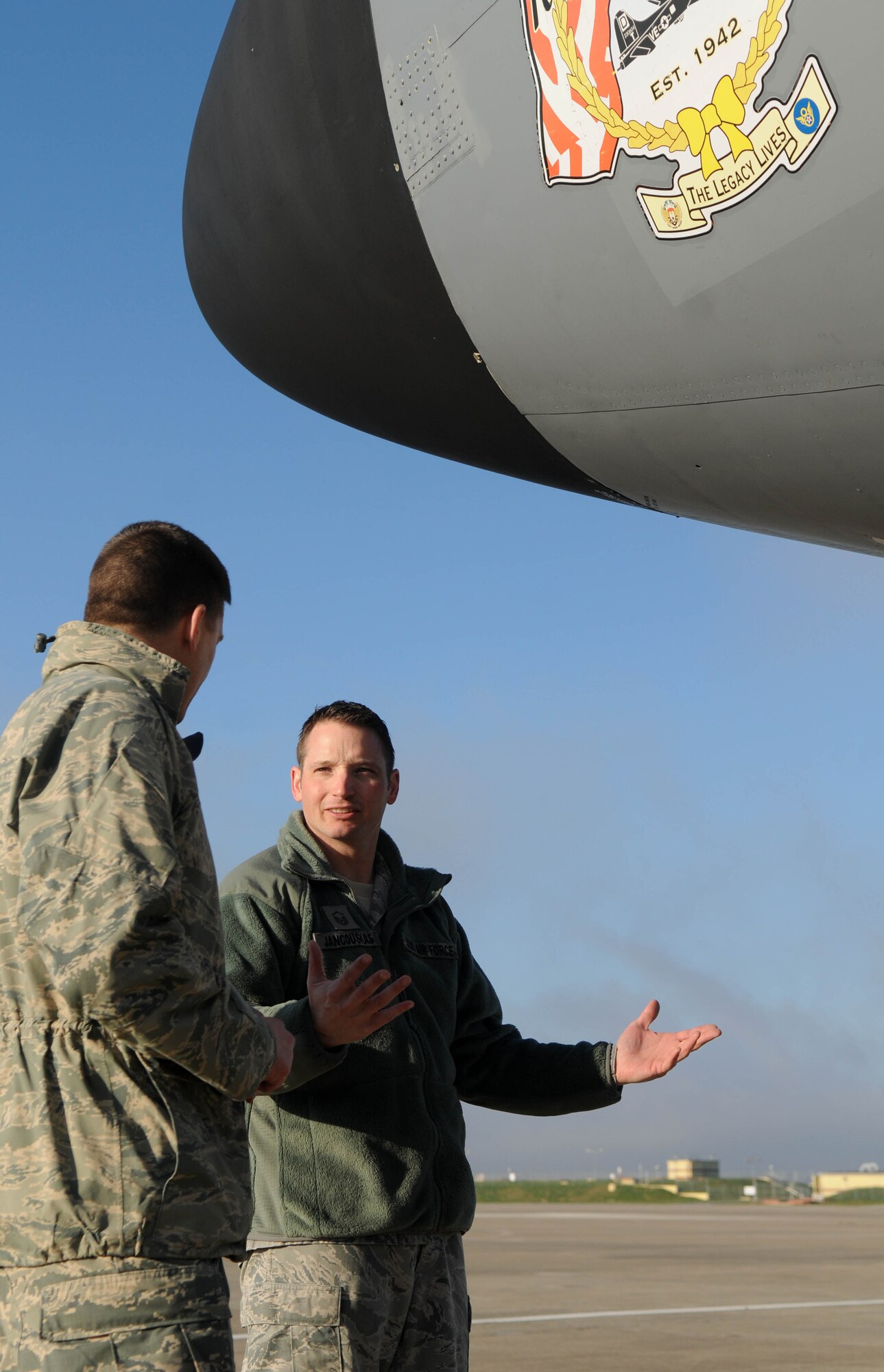 Master Sgt. William Jancouskas (right), 100th Aircraft Maintenance Squadron production superintendent and Castle Rock, Colo., native, shows Chief Master Sgt. Tracy Jones, 100th Air Refueling Wing command chief master sergeant, around a KC-135 Stratotanker at a base in southwest Europe. The newly appointed command chief accompanied Col. Christopher Kulas, 100th ARW commander, to the deployed base for a jet swap and took the opportunity to visit Airmen deployed from RAF Mildenhall, England, in support of French operations in Mali. (U.S. Air Force photo by Staff Sgt. Austin M. May)