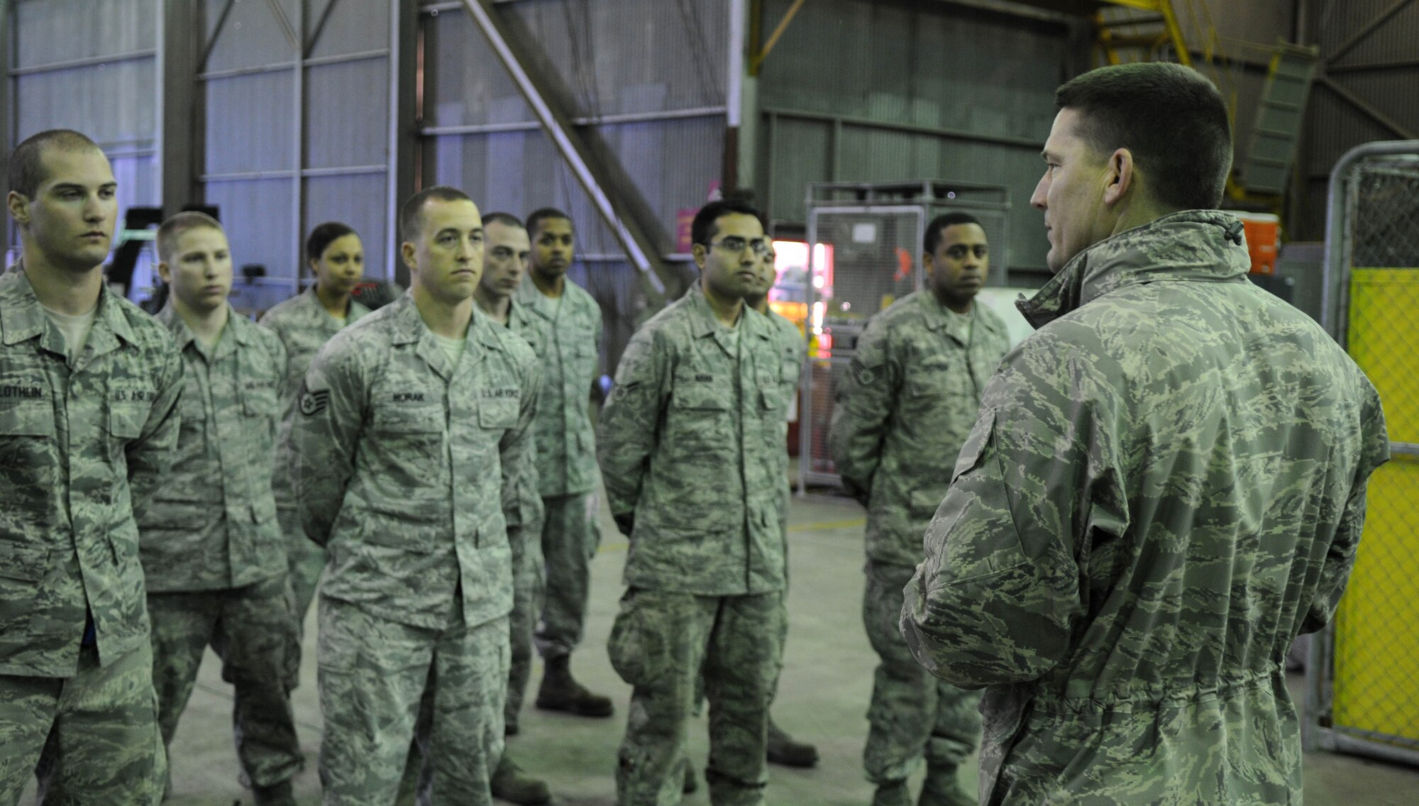 Chief Master Sgt. Tracy Jones, 100th Air Refueling Wing command chief master sergeant, addresses Airmen during morning role call Feb. 6, 2013. The Airmen are deployed to southwest Europe from RAF Mildenhall, England, in support of French operations in Mali. The newly appointed command chief accompanied Col. Christopher Kulas, 100th ARW commander, to the deployed base for a jet swap and took the opportunity to meet the Airmen he will lead at home. (U.S. Air Force photo by Staff Sgt. Austin M. May)
