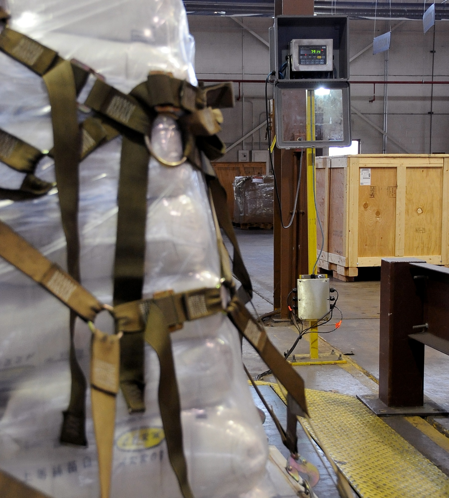 An aircraft pallet of rice is weighed on Barksdale Air Force Base, La., Feb. 5. Airmen from the 2nd Logistics Readiness Squadron air terminal operations packaged the skids on aircraft pallets to be flown to Port au Prince, Haiti. The rice will help feed more than 8,000 children a day. (U.S. Air Force photo/Staff Sgt. Amber Ashcraft)