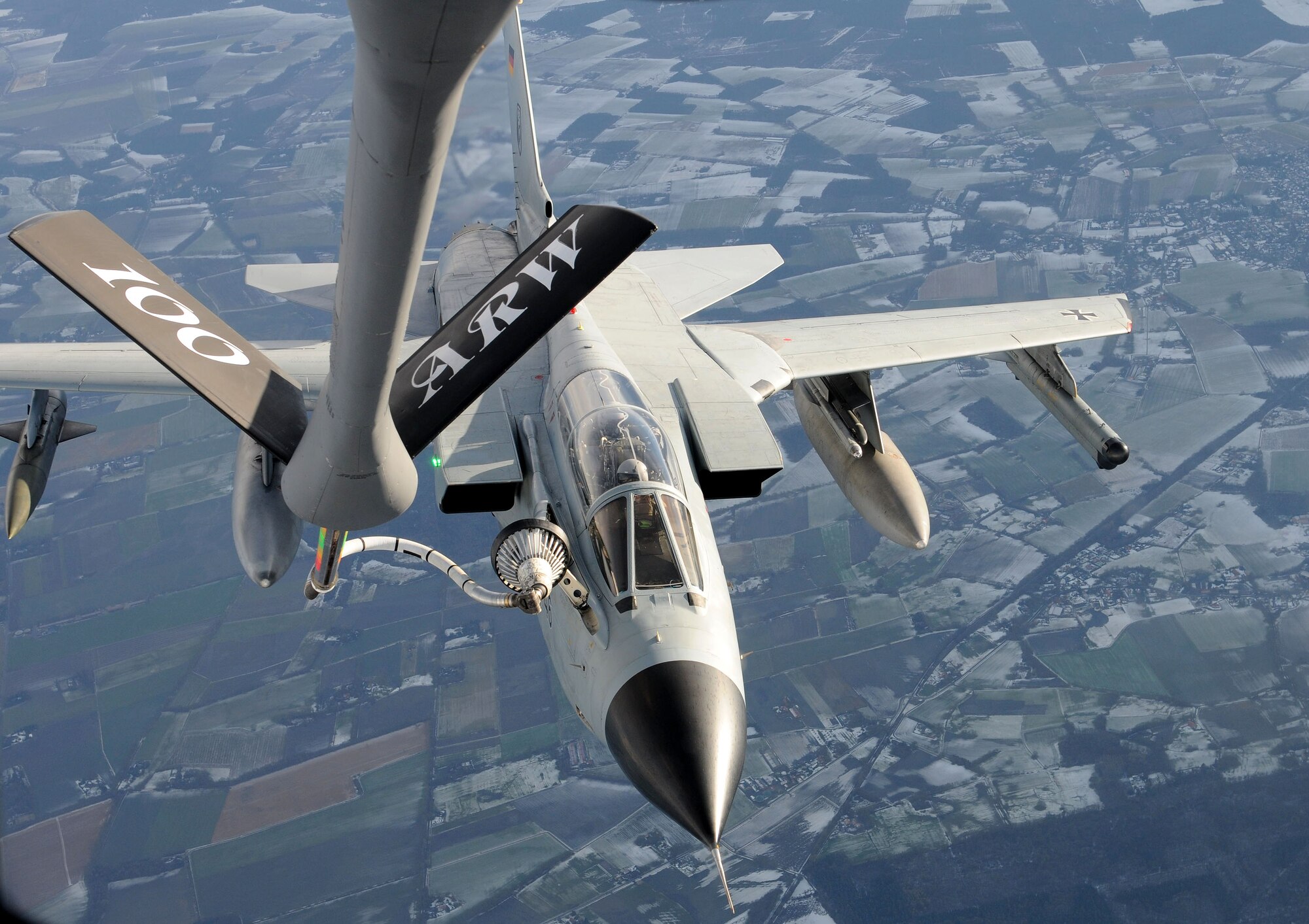 A Tornado PA-200 from Buechel Air Base, Germany, receives fuel from a KC-135R Stratotanker from the 100th Air Refueling Wing, RAF Mildenhall, England, Feb. 5, 2013 over Germany. The 100th ARW refuels aircraft throughout Europe, Africa and Southwest Asia. (U. S. Air Force photo by Master Sgt. Latisha Cole/Released)