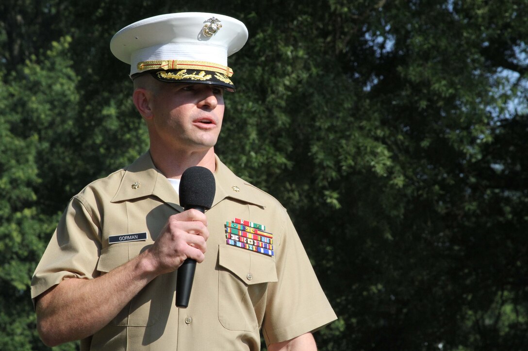 Maj. Brandon J. Gorman, the commanding officer of Marine Corps Recruiting Station Raleigh, speaks to Marines and distinguished guests during a change of command ceremony at North Carolina State University Raleigh, N.C. After 36 months with RS Raleigh, Maj. Jennifer A. Nash passed the responsibilities of commanding officer onto Gorman during the ceremony.