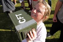 Milaca High School teacher Colleen Bell performs an ammo can lift during a modified combat fitness test on day two of Recruiting Station Twin Cities' educators workshop Jan. 29. For additional imagery from the event, visit www.facebook.com/rstwincities.  