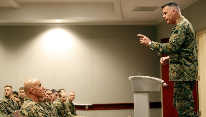 Brig. Gen. Niel E. Nelson, commanding general of 3rd Marine Logistics Group, speaks to a room of officers training in the Logistics Officer's Course aboard Camp Johnson Jan. 31 about what kinds of challenges they can expect to encounter when they get to their units. Nelson spoke about different tasks and possible deployments for the Marines, and he took questions from the crowd after his presentation. Questions ranged from the recent decision to lift the ban for women in combat to the continued downsizing of the Marine Corps.


