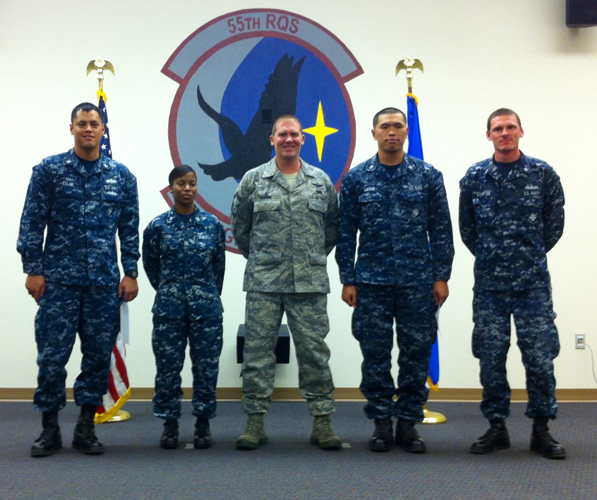 Senior MasterSgt. Kirk Sather with Navy First Responders (L to R) Hospital Corpsman First Class Jaime Kalaw, Hospital Corpsman Second Class Joanna Dunn,  Hospital Corpsman Second Class Jonathan Kwong, Information Technician Second Class Timothy Chartier. (Photos by NOSC TUCSON Public Affairs)