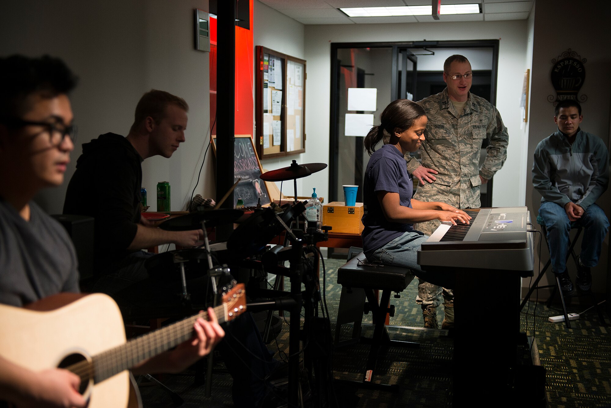 Airman 1st Class Mimi Greasham, a 19th Comptroller Squadron financial technician, plays the keyboard Feb. 1, in the Crossroads Café at Little Rock Air Force Base. Greasham also plays the drums and sings in her spare time. (U.S. Air Force photo by Airman 1st Class Regina Agoha) 