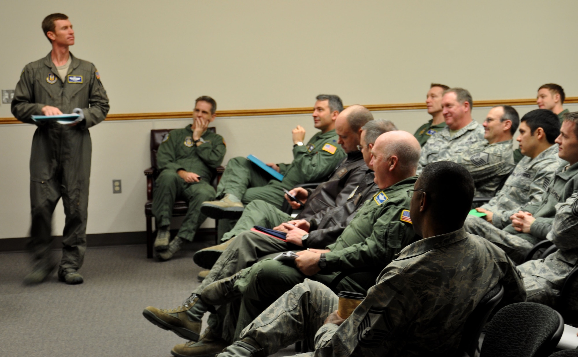Lt. Col. Scott Amerman (left) takes role for an Operation Deep Freeze pre-departure briefing Jan. 6. The group of 35 Airmen from both the 446th and 62nd Airlift Wings are preparing to fly to Chrischurch, New Zealand to carry out the last nine missions of the ODF 2012-2013 season in Antarctica. (U.S. Air Force Photo/Airman 1st Class Madelyn McCullough)