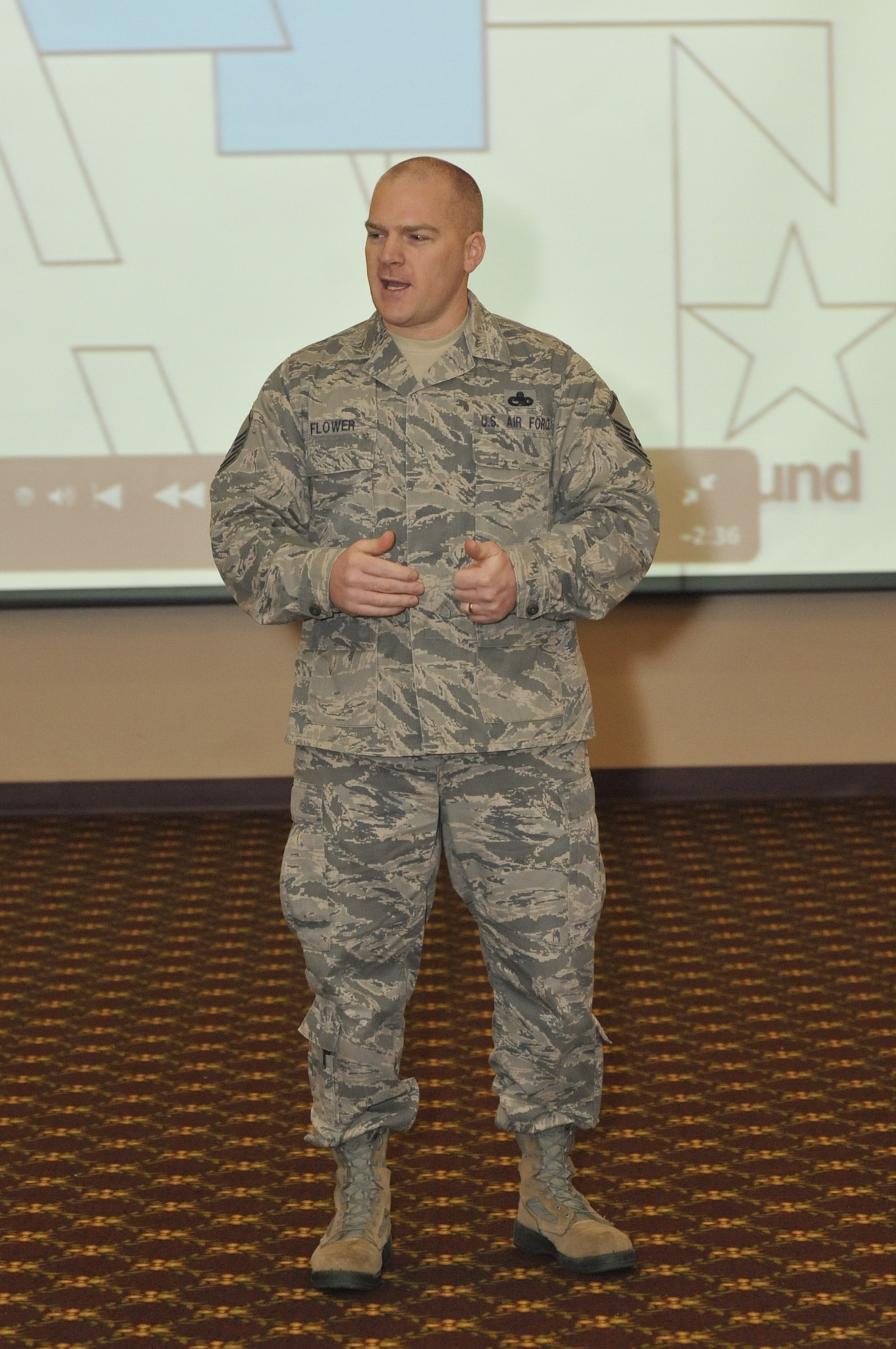 Master Sgt. Sean Flower, 305th AMW plans program NCO in-charge, talks about the Air Force Assistance Fund helped him and his family Feb. 4, 2013, at Tommy B's community center, during the annual AFAF kick-off event. The AFAF was established to provide for an annual effort to raise funds for the charitable affiliates that provide support to the Air Force family (active duty, retirees, reservists, guard and their dependents, including surviving spouses) in need. These organizations are the Air Force Villages, Inc., the Air Force Aid Society, Inc., the General and Mrs. Curtis E. LeMay Foundation, and the Air Force Enlisted Village, Inc. The organizations help Air Force people with aid in an emergency, with educational needs, or to have a secure retirement home for widows or widowers of Air Force members in need of financial assistance.  (U.S. Air Force photo by Wayne Russell/Released)