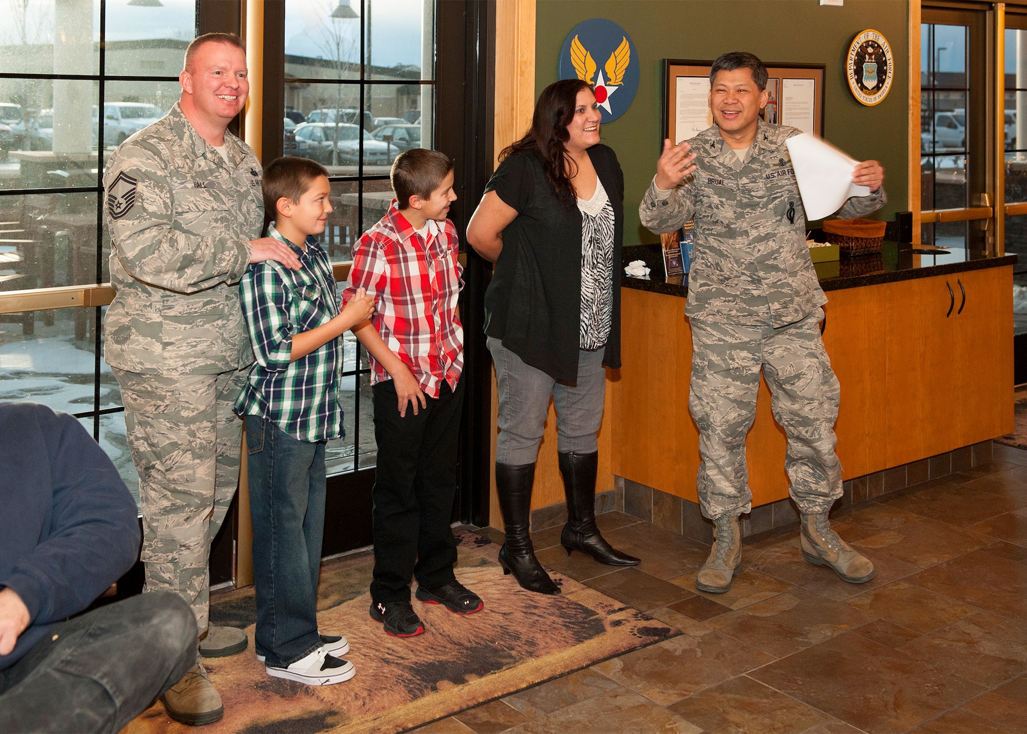 Col. H.B. Brual, former 341st Missile Wing commander, recognizes Rhonda Hall, wife of Senior Master Sgt. Jerry Hall, 341st Communications Squadron first sergeant, (left), as the Air Force Association Joan Orr Spouse of the Year recipient for Air Force Global Strike Command during a ceremony at the Grizzly Bend on Jan. 24. Hall received the award after donating nearly 900 volunteer hours at more than 49 events and raised more than $15,000 for the base and Great Falls community. (U.S. Air Force photo/Beau Wade)