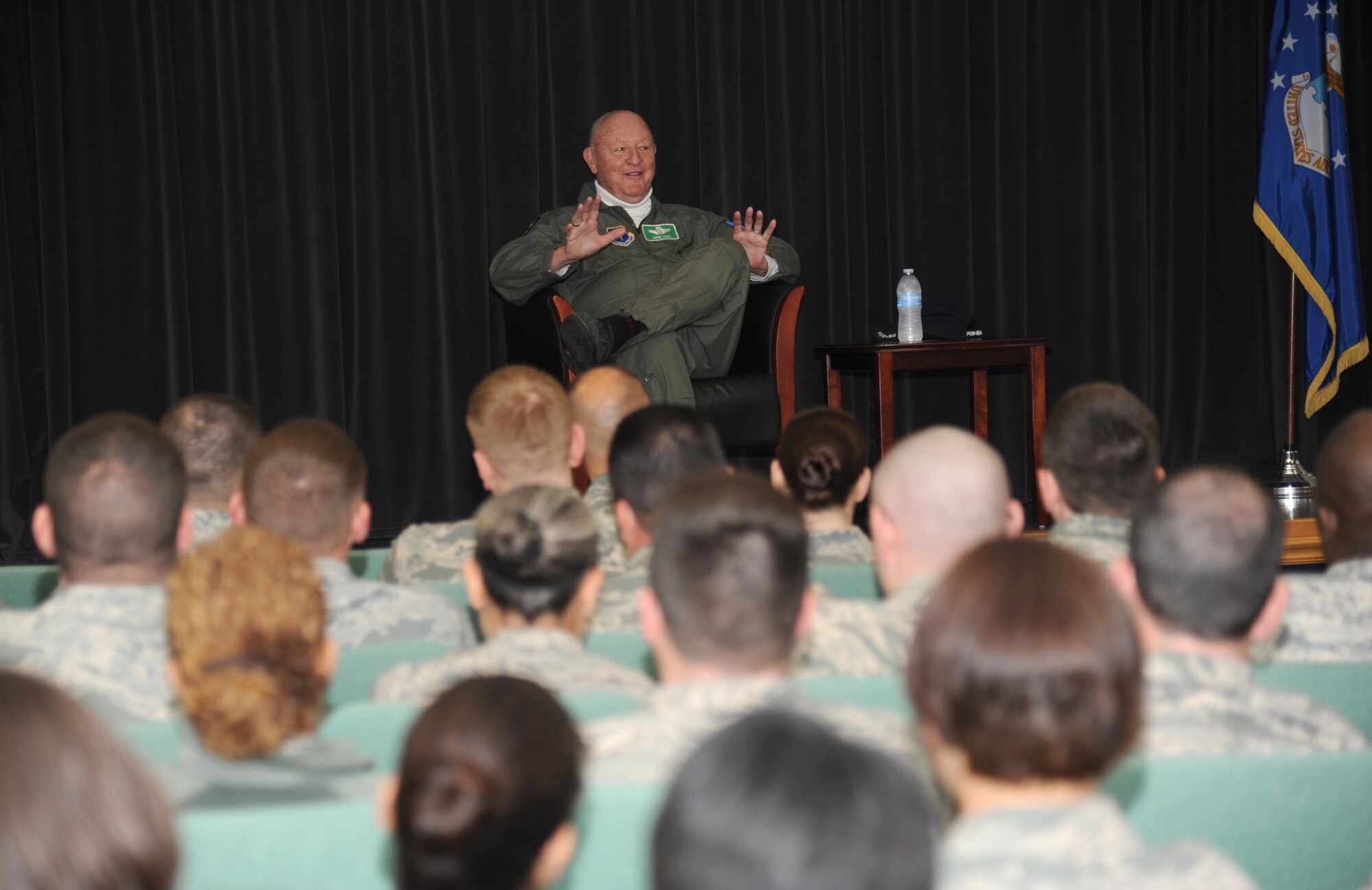 Retired Lt. Col. John “Jack” Yuill, a former prisoner of war in North Vietnam, speaks to Airmen from the airmen leadership school and the Mathies NCO Academy Feb. 5, 2013, at the Mathies NCO Academy, Keesler Air Force Base, Miss.  Yuill was interned as a POW after he was shot down Dec. 22, 1972, and was held until his release on March 29, 1973.  (U.S. Air Force photo by Kemberly Groue)