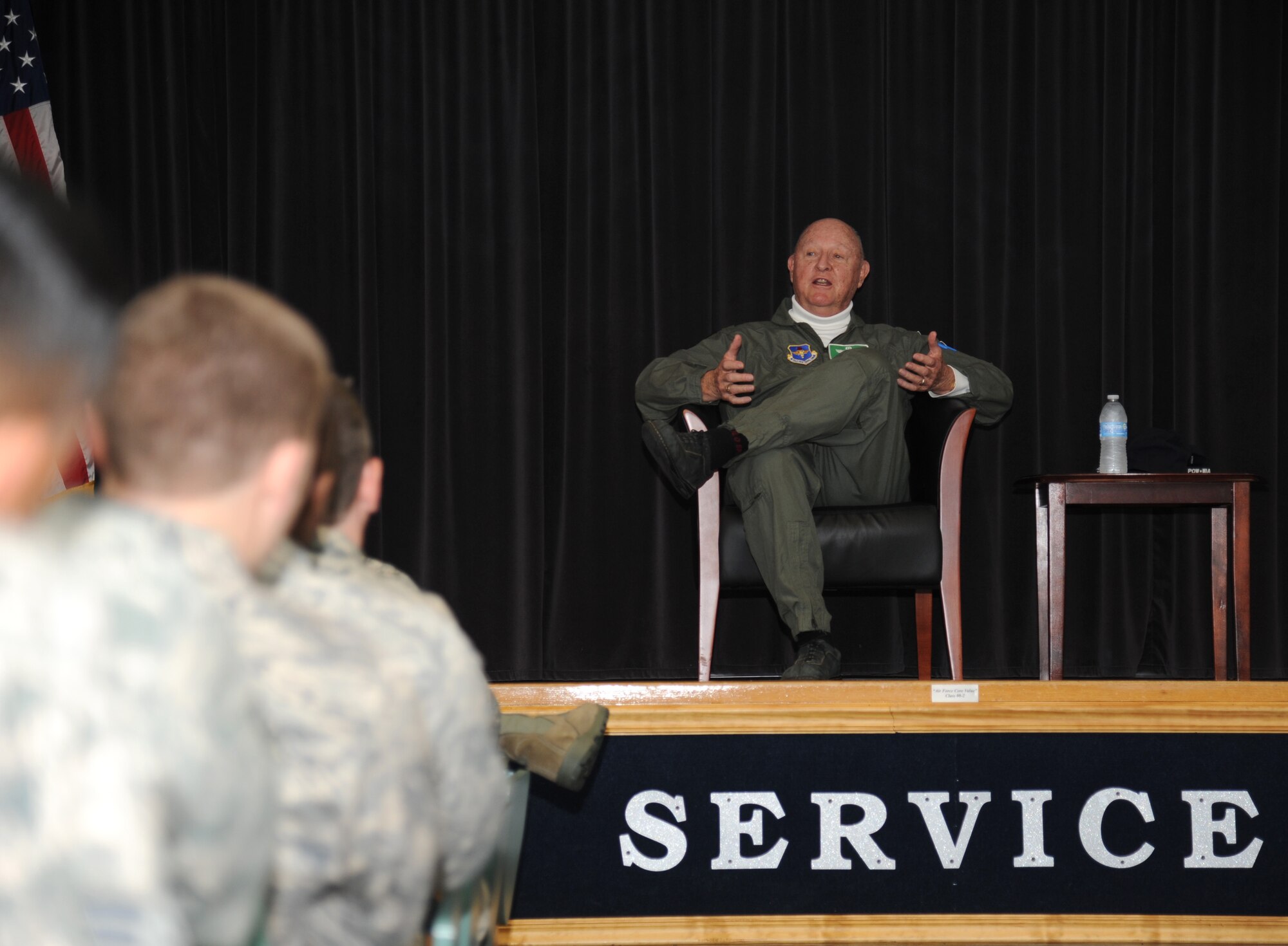 Retired Lt. Col. John “Jack” Yuill, a former prisoner of war in North Vietnam, speaks to Airmen from the airmen leadership school and the Mathies NCO Academy Feb. 5, 2013, at the Mathies NCO Academy, Keesler Air Force Base, Miss.  Yuill was interned as a POW after he was shot down Dec. 22, 1972, and was held until his release on March 29, 1973.  (U.S. Air Force photo by Kemberly Groue)
