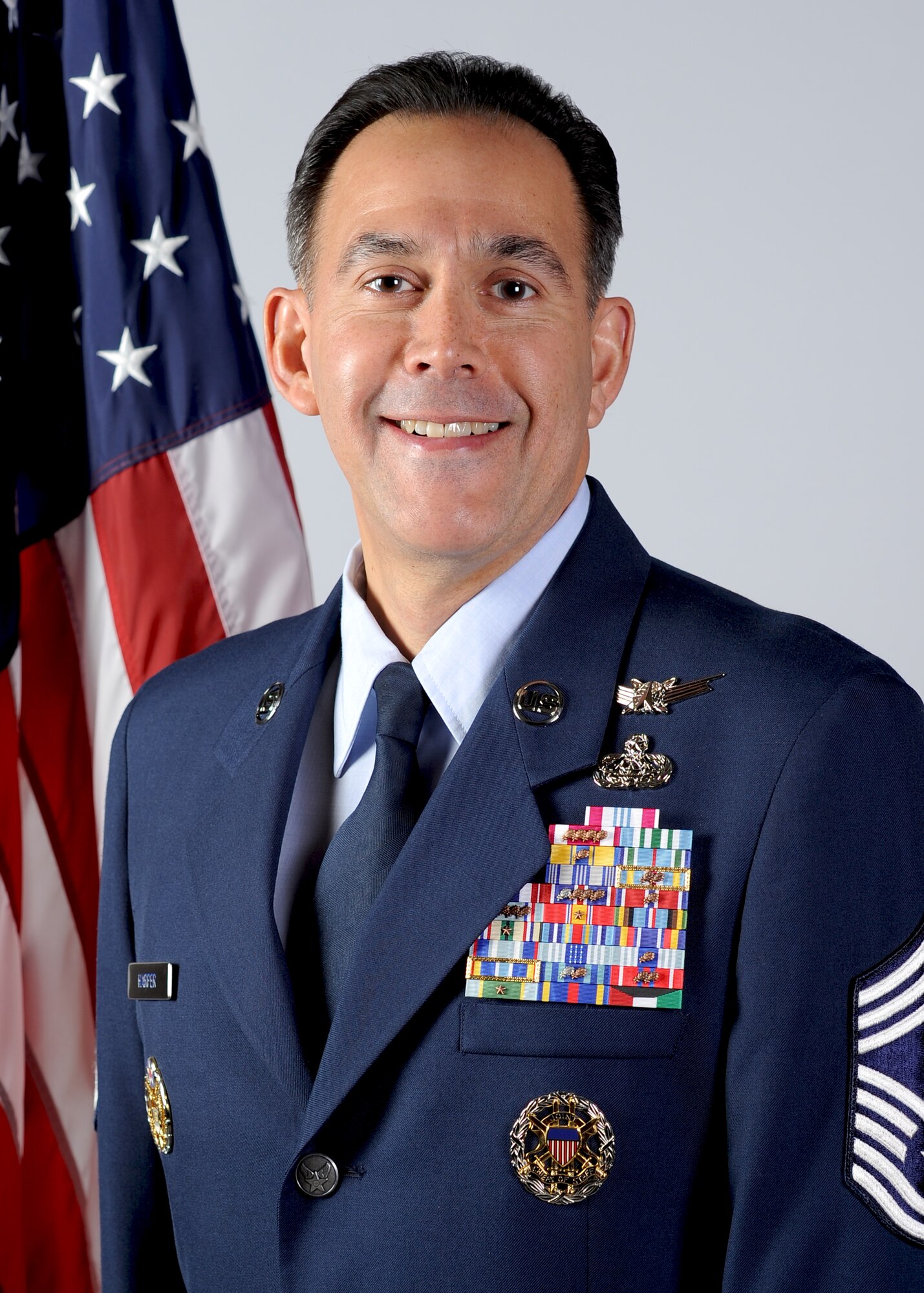 Chief Master Sgt. Mark Harper’s, 460th Operations Group superintendent, 30-year career lays out the framework for the path from airman basic to chief master sergeant. Harper started his Air Force journey March 8, 1983, as a law enforcer and quickly transitioned into a military working dog handler. Over the course of his multiple assignments and deployments, Harper progressed through the ranks. (U.S. Air Force photo by Staff Sgt. Nicholas Rau/Released)
