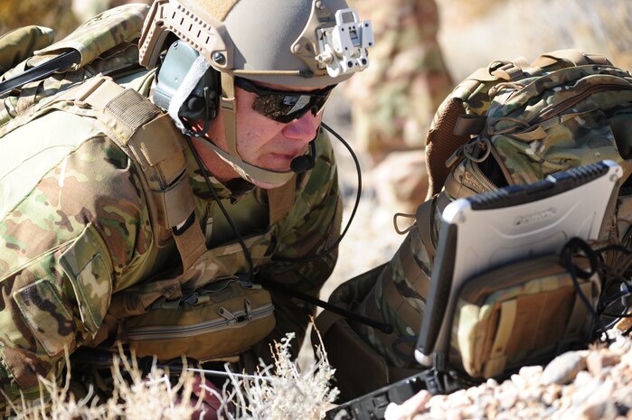 U.S. Air Force Master Sgt. Bryan Patton, Air Force Weapons School Joint Terminal Attack Controller instructor, uses Digitally Aided Close Air Support program during the JTAC Advanced Instructor Course at the Nevada Test and Training Range Jan. 28, 2013. DACAS provides JTACs with a map of the battle space in which they can mark targets and friendly forces. (U.S. Air Force photo by Staff Sgt. William P. Coleman)