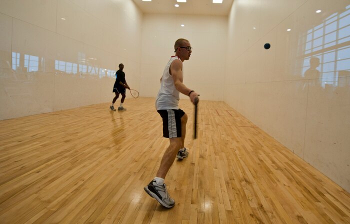 Eugen Kavalenka, 99th Medical Group, plays a game of racquetball against Vernon Sublett, 99th Logistics Readiness Squadron, during the 2013 Warrior Fitness Center racquetball tournament Feb. 2, 2013, at Nellis Air Force Base, Nev. Tournaments like this one give Airmen opportunities to play sports competitively. The sport of racquetball was invented in 1950, at Greenwich, Conn., and is now a game which is played across the world. (U.S. Air Force photo by Senior Airman Daniel Hughes)